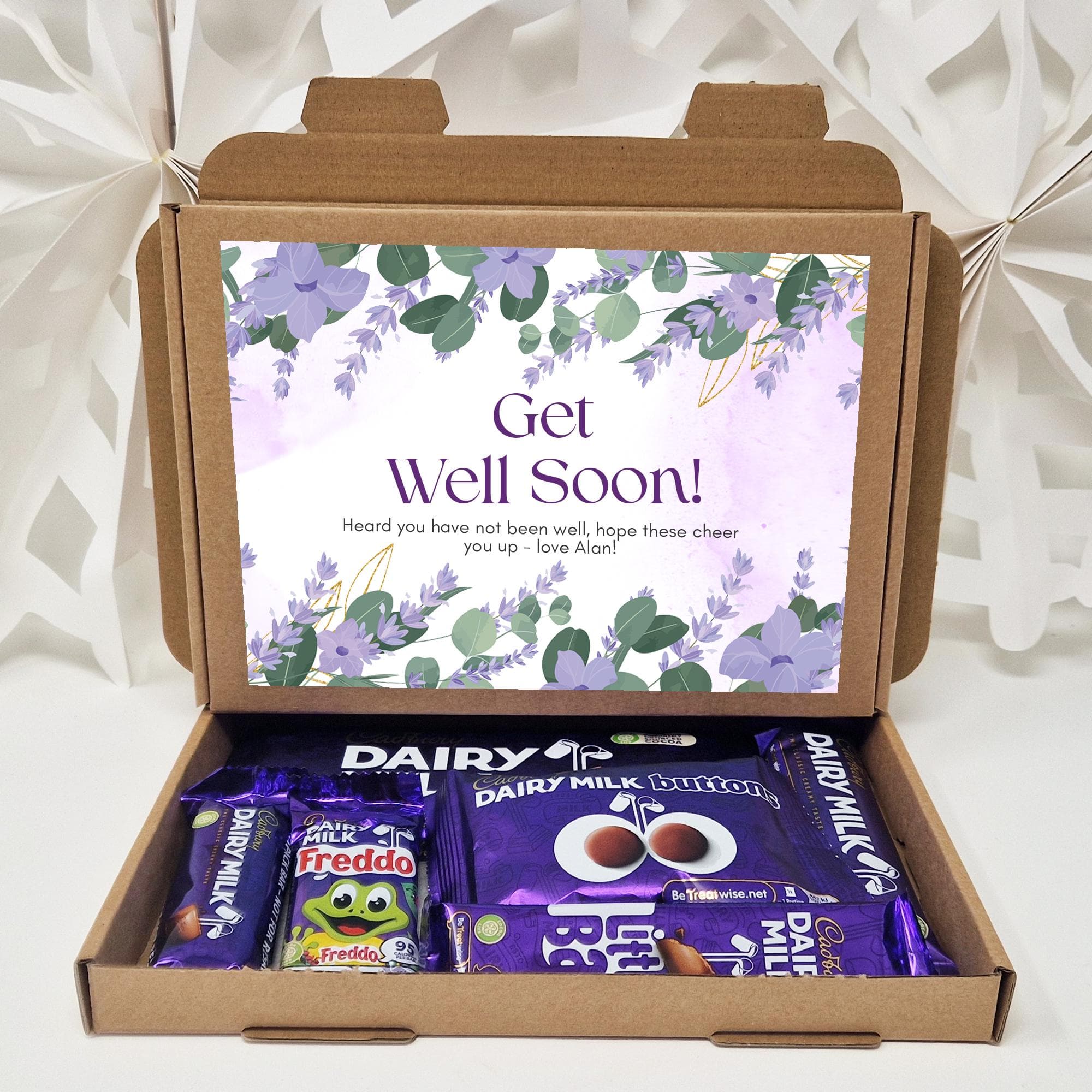 A beautifully designed, personalised Cadbury Dairy Milk chocolate gift box for any occasion, including Birthday, Mother’s Day, Thank You, Get Well Soon, and Thinking of You. The box features a printed message on the outside, with a selection of original, branded Dairy Milk chocolate bars inside. Professionally packaged for gifting, with no paperwork included. Perfect for chocolate lovers and special celebrations.