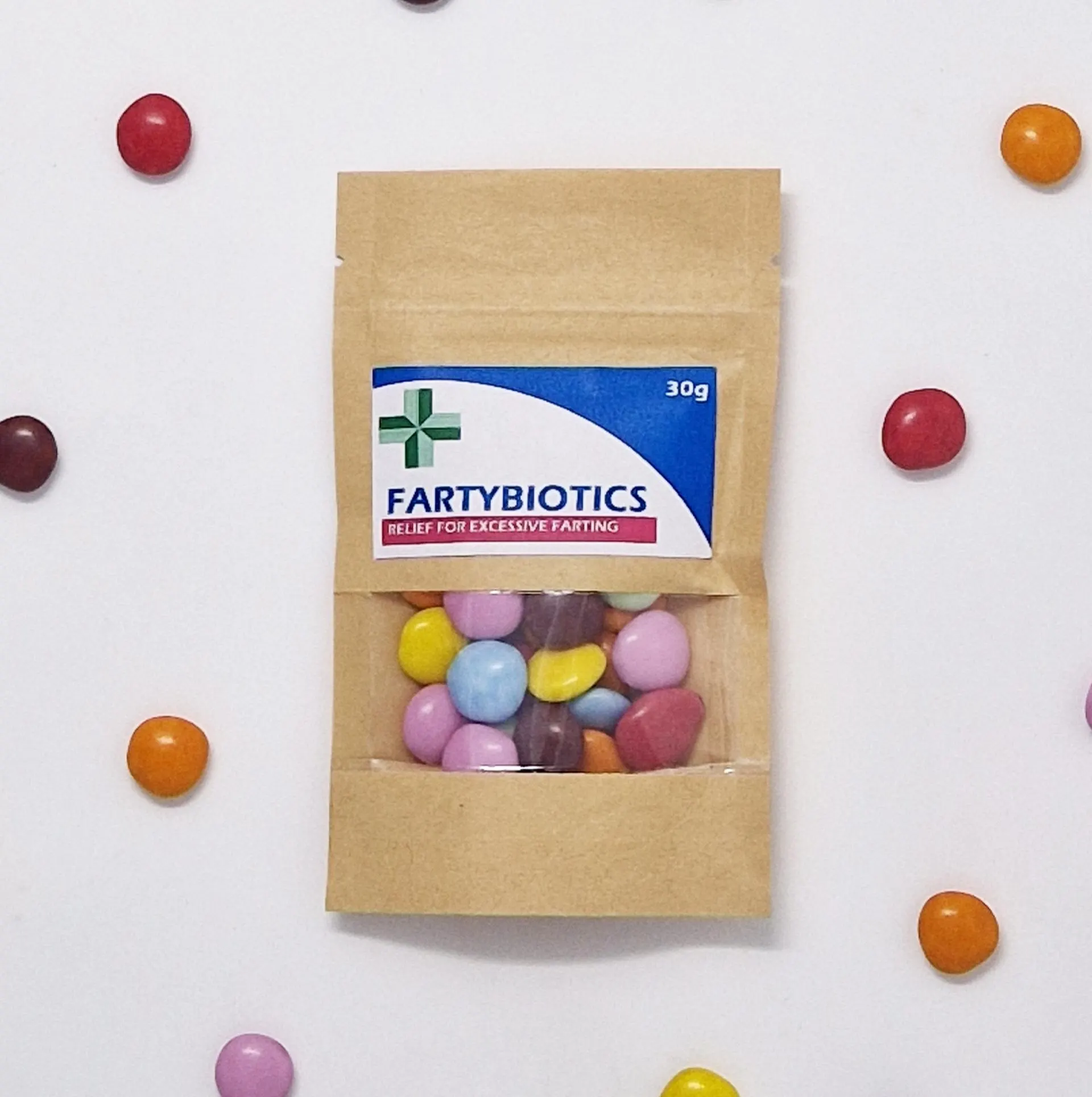 Funny novelty sweet bag labeled 'Anti-Farting & Anti-Moaning Old Git Pills' – a hilarious gag gift featuring a bold, cheeky design. Includes approx. 35g of colourful Smarties in the pre-filled option, or choose an empty bag to fill with your own treats. Perfect for birthdays, retirements, or any fun occasion. A lighthearted chocolate joke gift guaranteed to bring laughs to friends and family of all ages