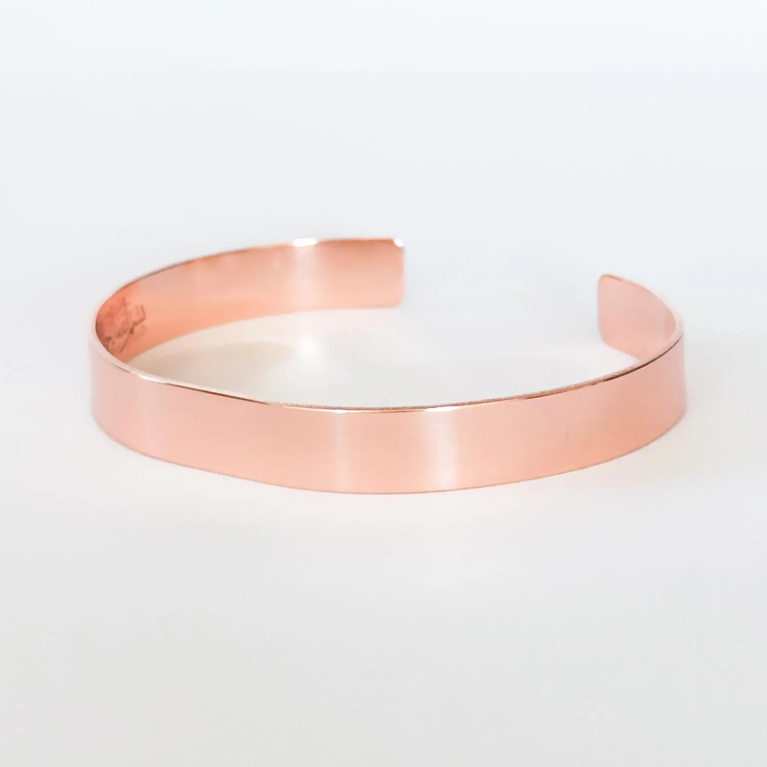 Spiritual protection copper bracelet with evil eye Nazar verse for daily wear.