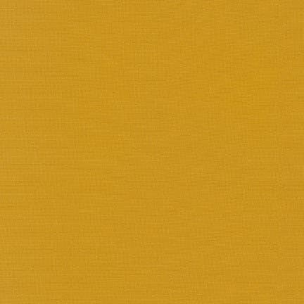 Kona Cotton Solid Curry Robert Kaufman K001-1677 Sold in HALF yard increments.