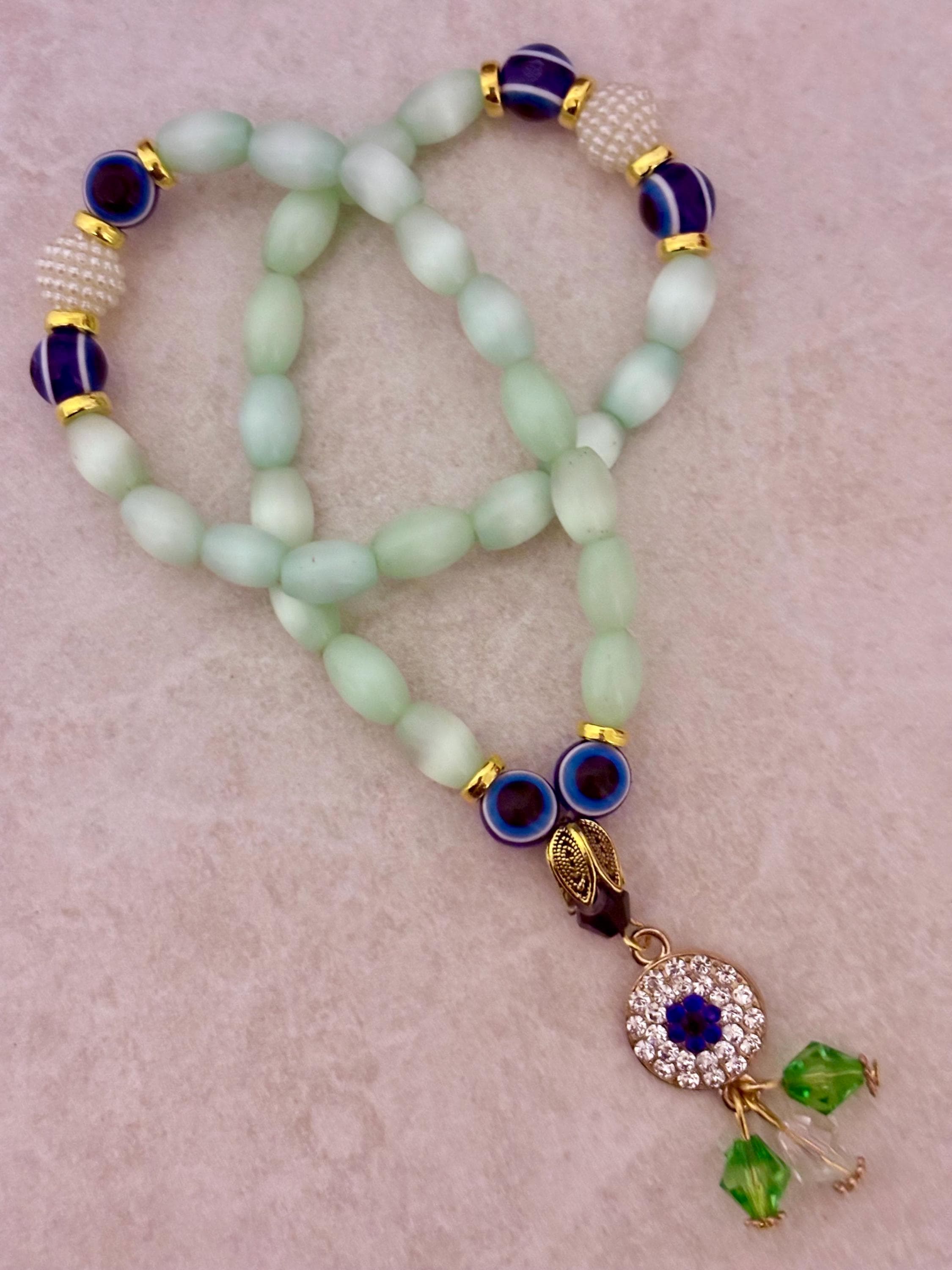 33 cat’s eyes and evil eyes beads Tasbih - image 4