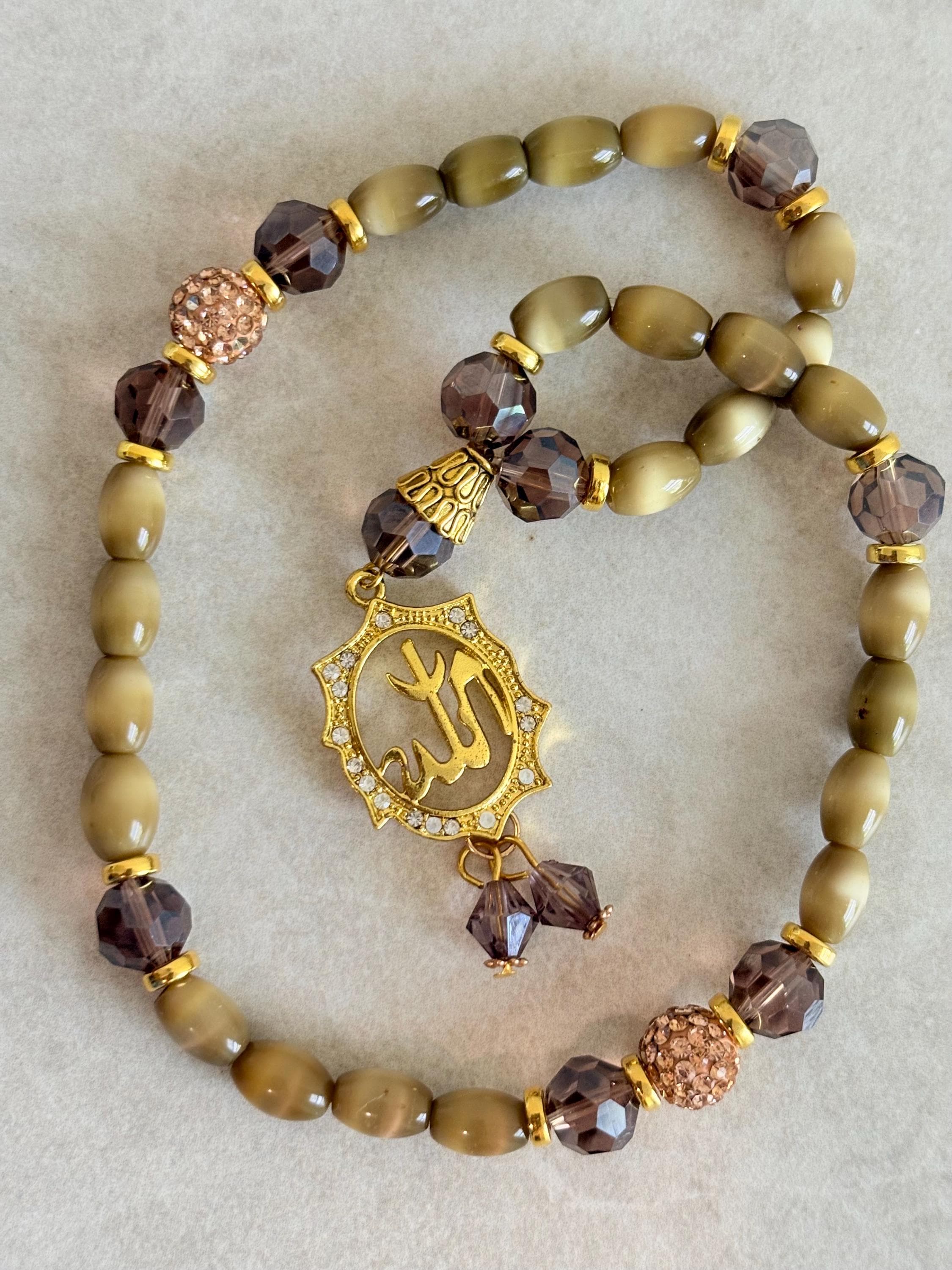 33 cat’s eyes beads Tasbih