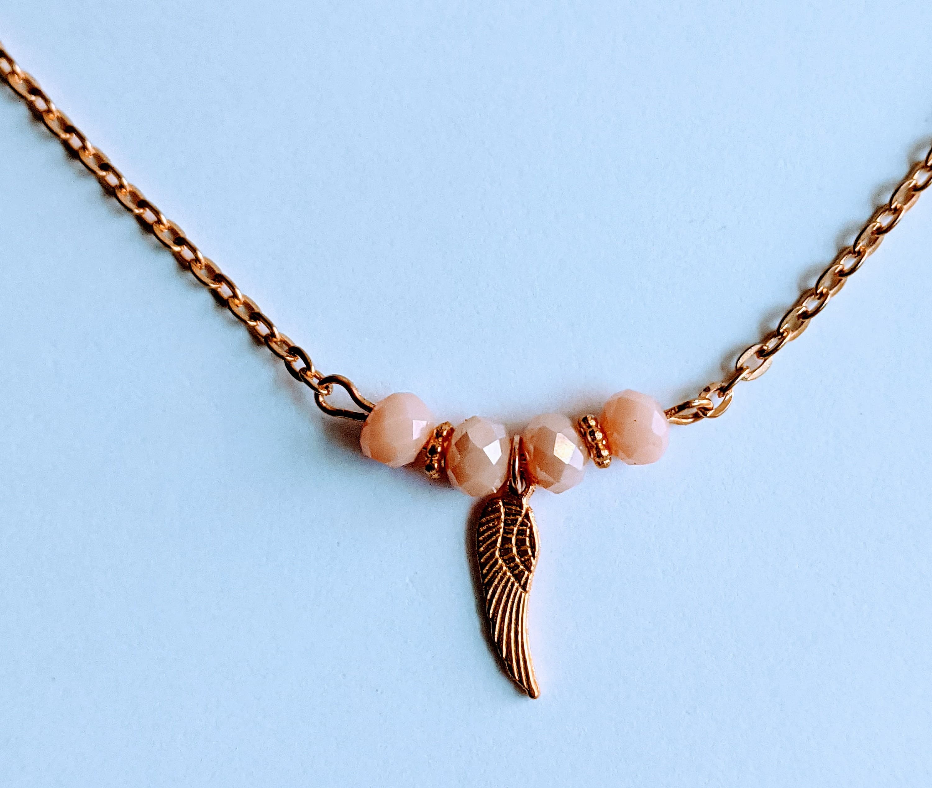Crystal Beaded Necklace with Gold Wing Charm - image 4