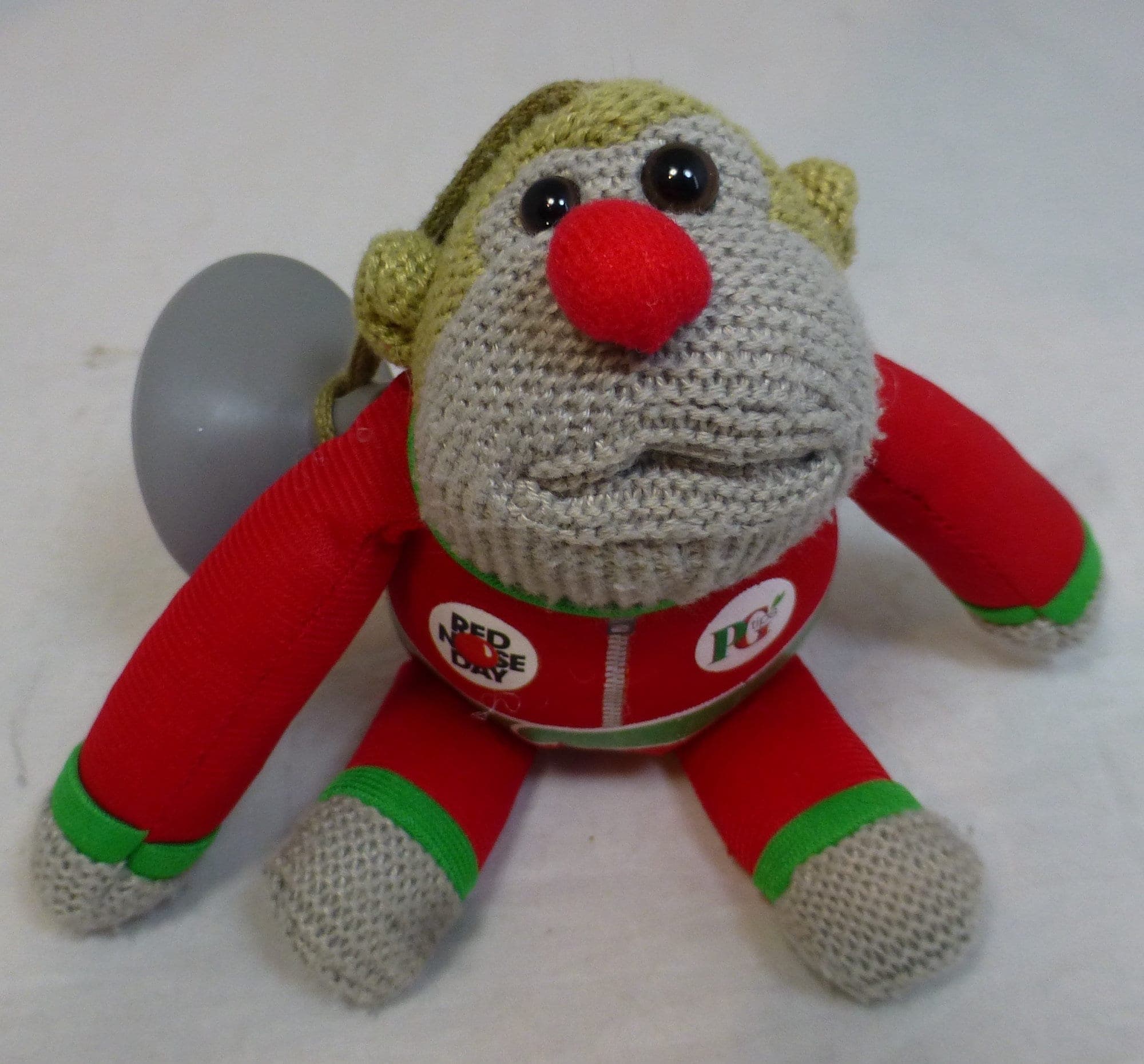 PG Tips Tea Red Nose Day Knitted Monkey with Suction Cup Red & Green Suit Beanie 6 inch Toy with Red Nose - Comic Relief Most Famous Monkey