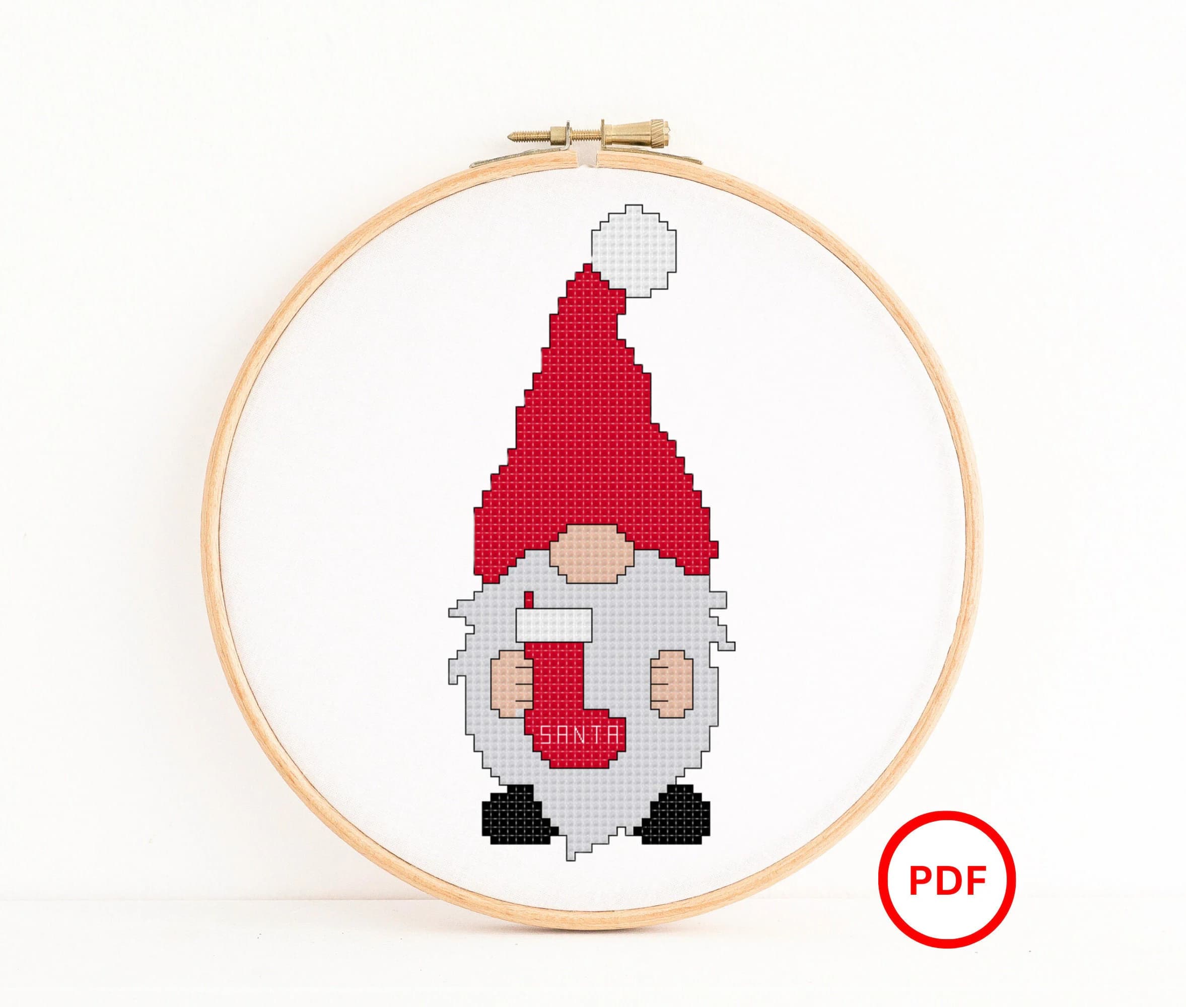 Santa Gnome holding a Stocking Cross Stitch Pattern