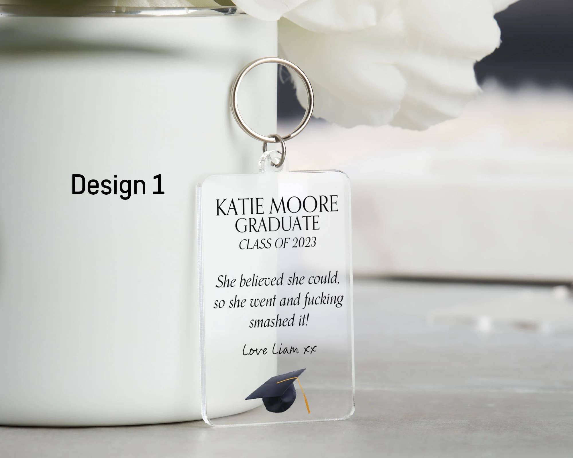 Funny humours graduation gift quote gift on a key ring. Options of different quotes on key-rings all personalised with quotes, name of graduate and year of graduation. Bestseller for graduation gift for daughter, son, best friend.