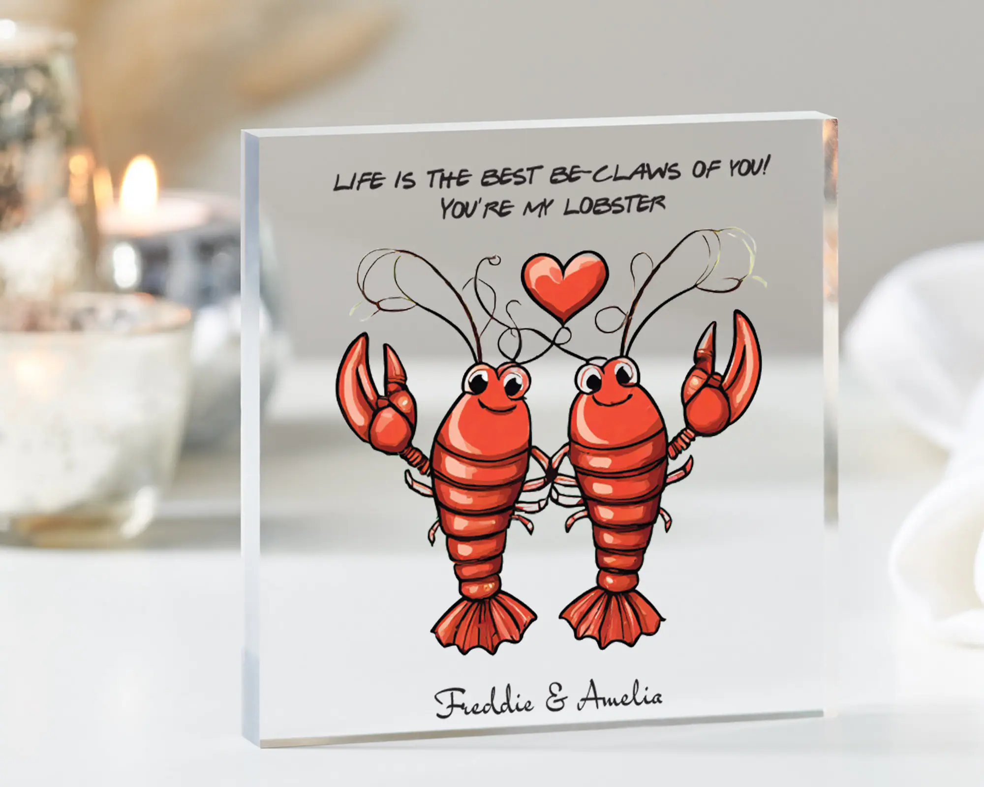 Two lobsters printed on clear acrylic block. Quote on top reads Life is the best be-claws of you! You're my lobster. Personalised with two name printed below. Bestseller for friends gift for Valentines gifts, funny birthday gift for partner.