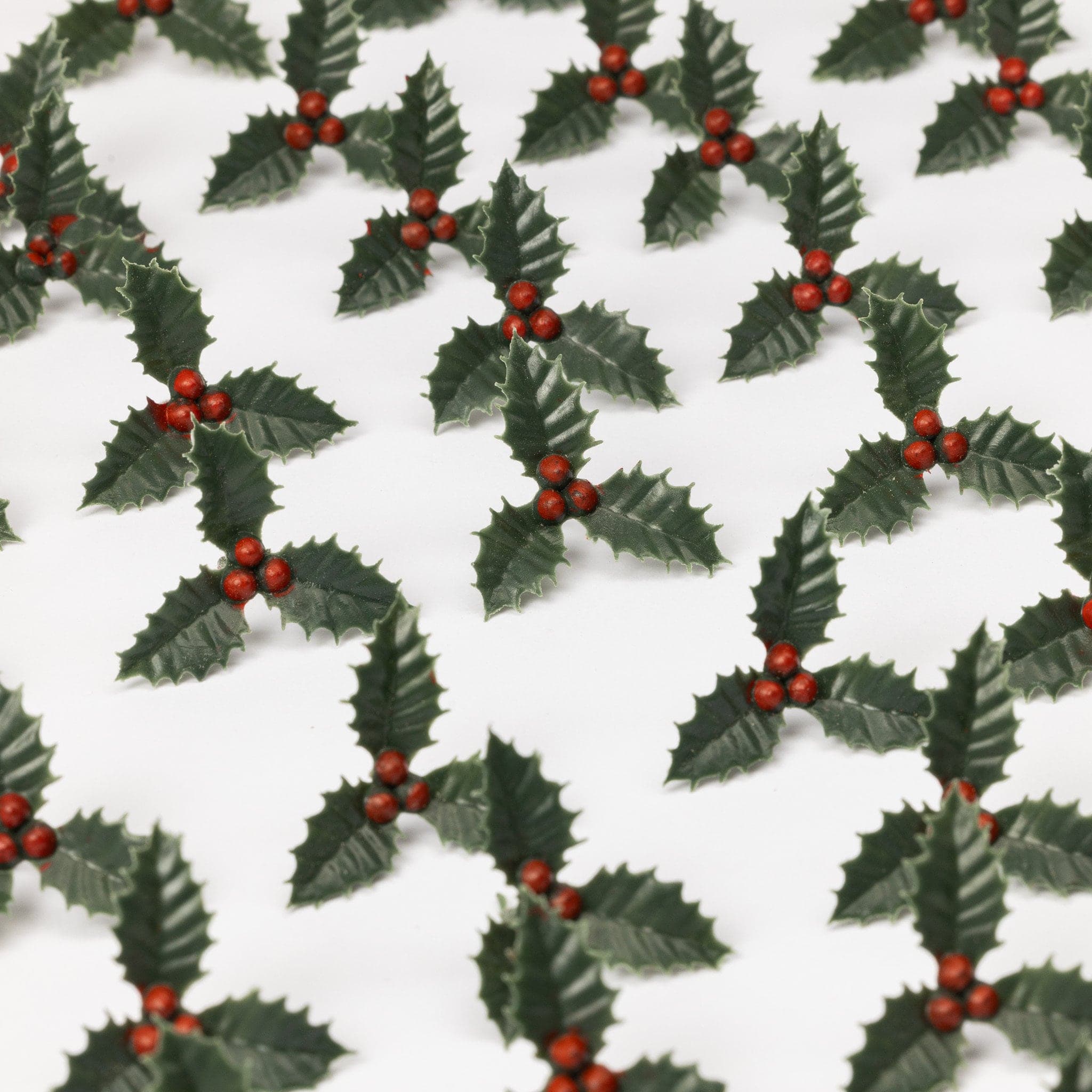 Plastic Holly Leaf Cake Decoration: Christmas Cupcake Topper (37mm, 20pc)
