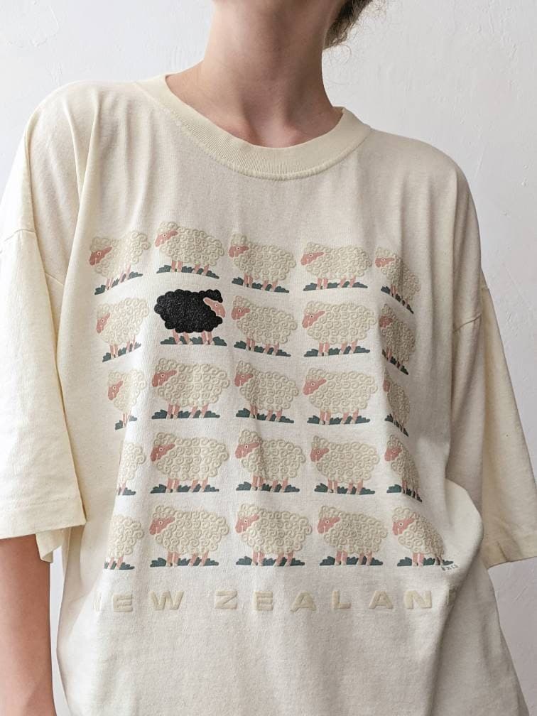 black sheep t-shirt vintage 1990s graphic tee New Zealand spell out, signed ©'91 C.D., creamy cotton, single stitch, ribbed crew neck - image 3