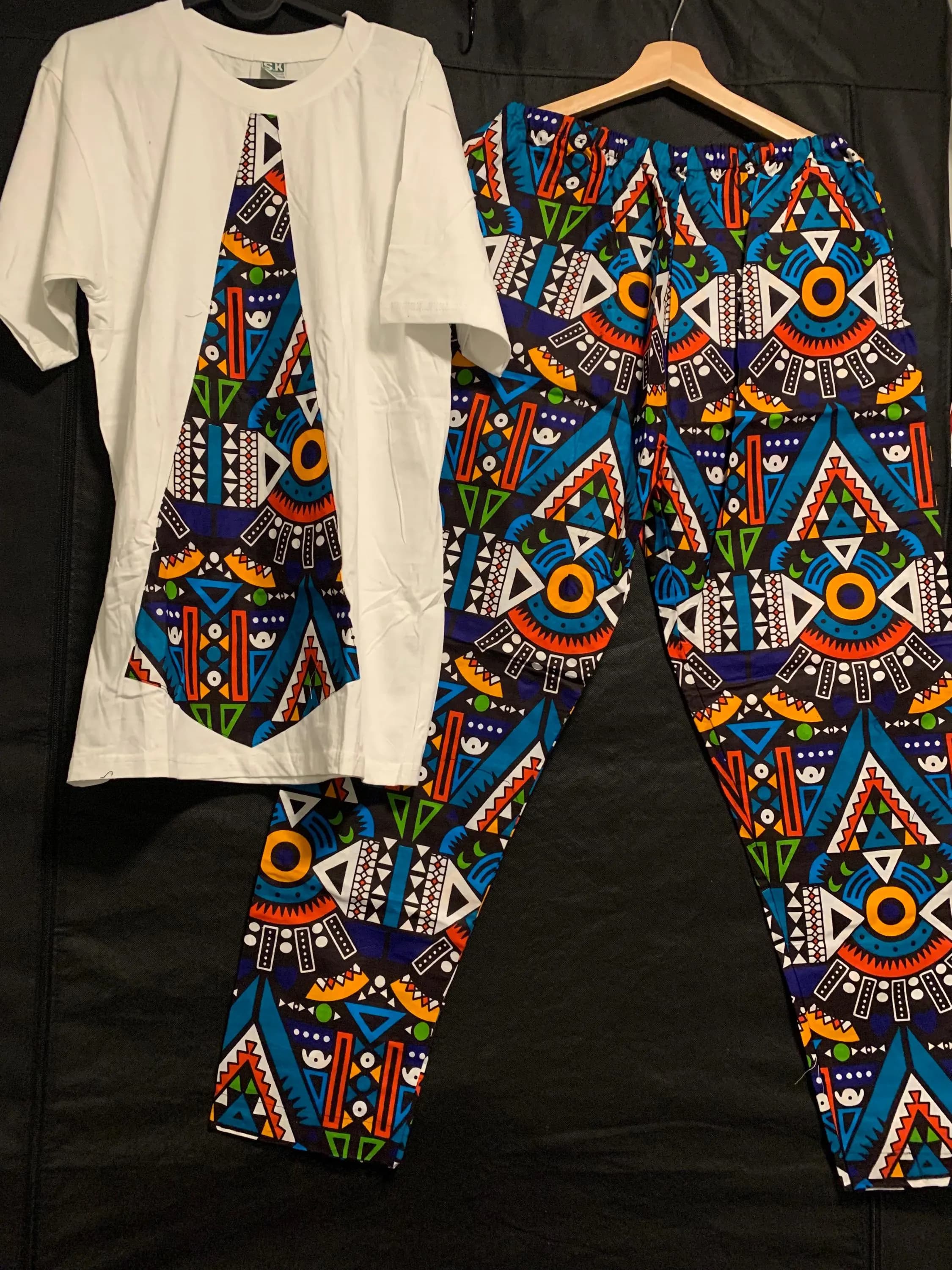 African Print Matching Set for Men | White T-Shirt and Colorful Ankara Wax Trousers | Traditional Geometric Tribal Graphic Streetwear Co-ord - image 4