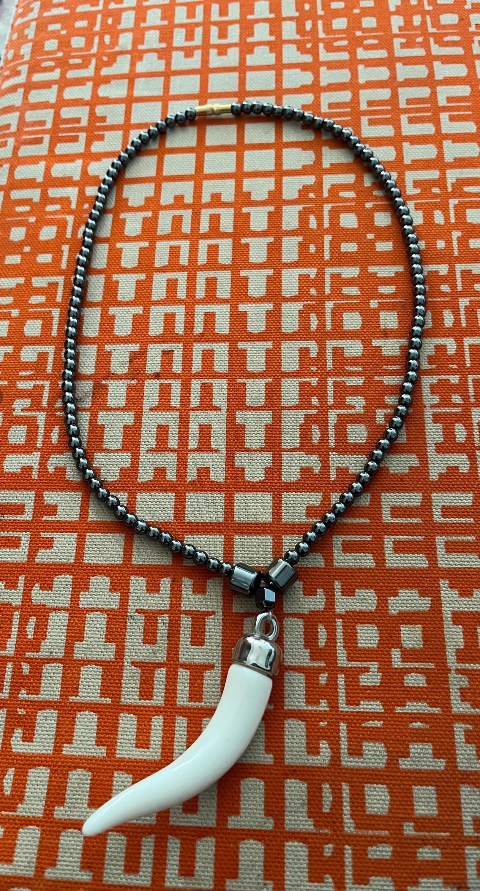 Hematite Beaded Necklace with White Tusk Pendant, Minimalist Statement Jewelry, Boho Tribal Necklace, Unisex Gift, Protection Stone Jewelry