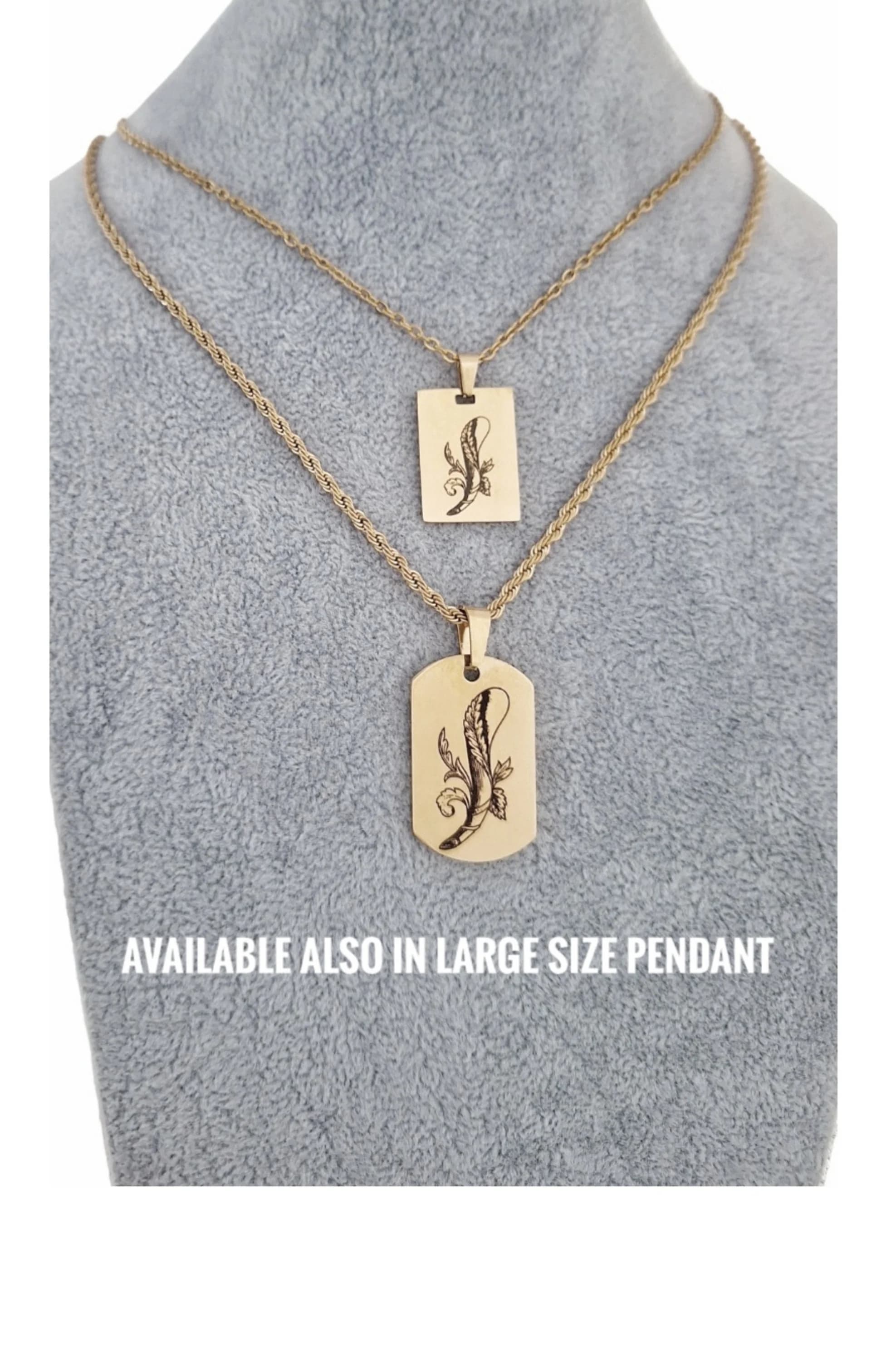Two gold necklaces with a rope chain style. The necklaces have a pendant with a floral design. The text "AVAILABLE ALSO IN LARGE SIZE PENDANT" is at the bottom of the image.