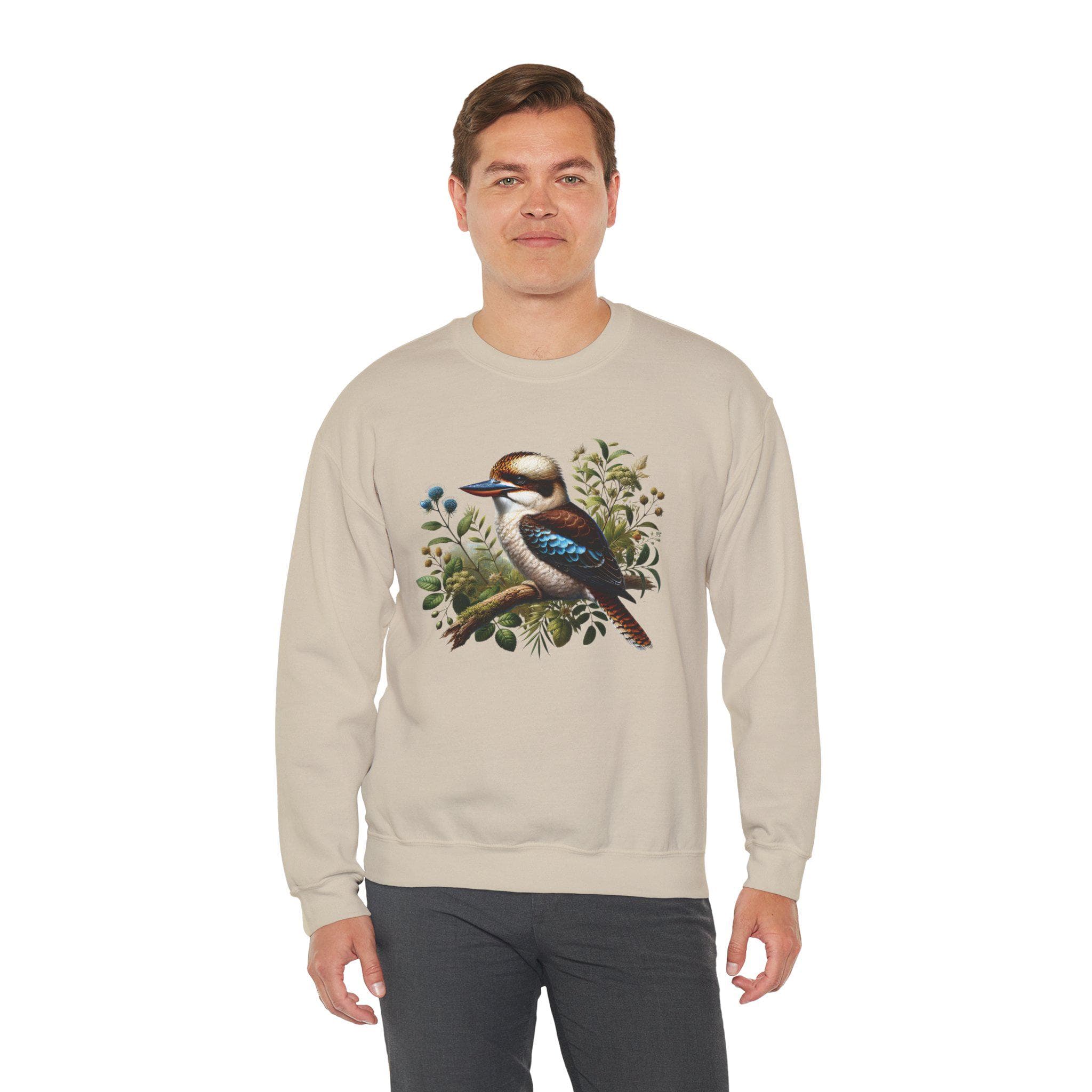 Celebrate the beauty and charm of Australia's iconic wildlife with this delightful Gildan 18000 sweatshirt, featuring a cute kookaburra sitting peacefully on a branch. Whether you're an Australian wildlife lover, a nature enthusiast, or someone who appreciates unique bird-themed apparel, this sweatshirt is a charming way to express your love for the natural world.
This Kookaburra shirt is available in multiple attractive colors and sizes from Small to 5XL.