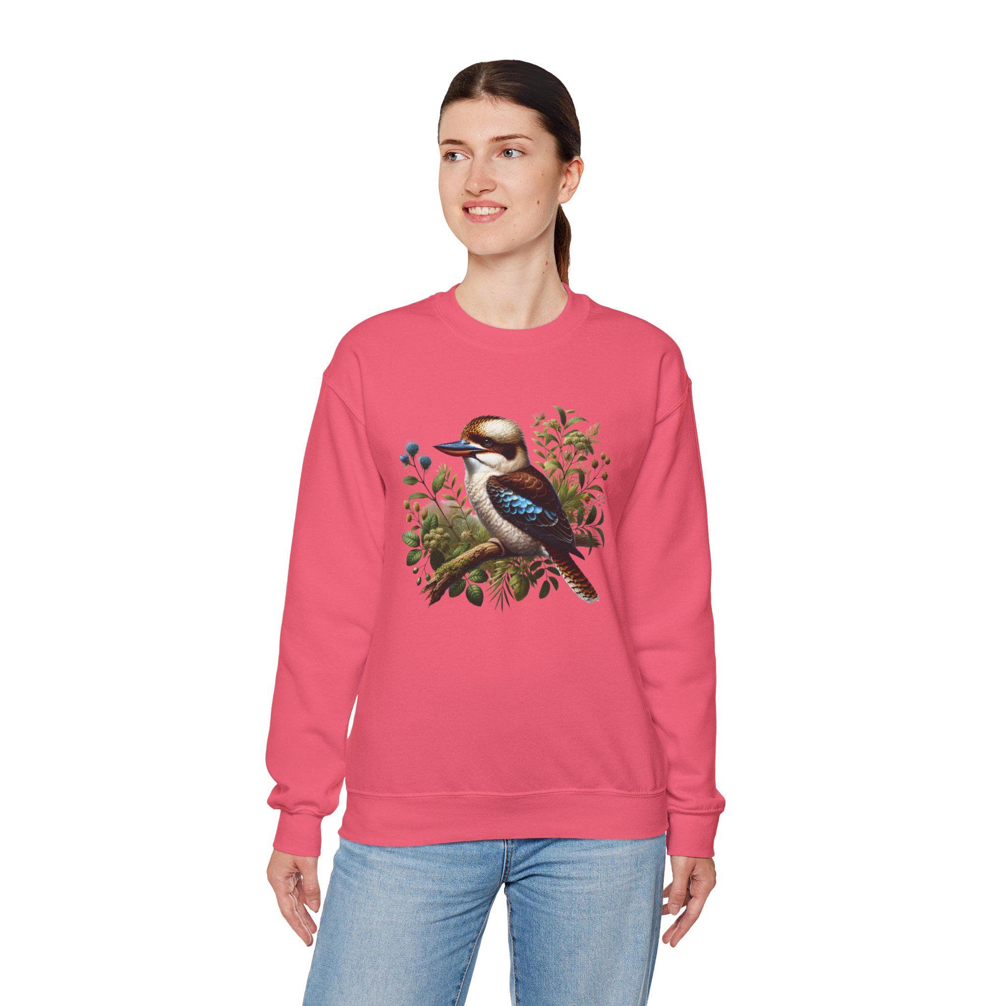 Celebrate the beauty and charm of Australia's iconic wildlife with this delightful Gildan 18000 sweatshirt, featuring a cute kookaburra sitting peacefully on a branch. Whether you're an Australian wildlife lover, a nature enthusiast, or someone who appreciates unique bird-themed apparel, this sweatshirt is a charming way to express your love for the natural world.
This Kookaburra shirt is available in multiple attractive colors and sizes from Small to 5XL.
