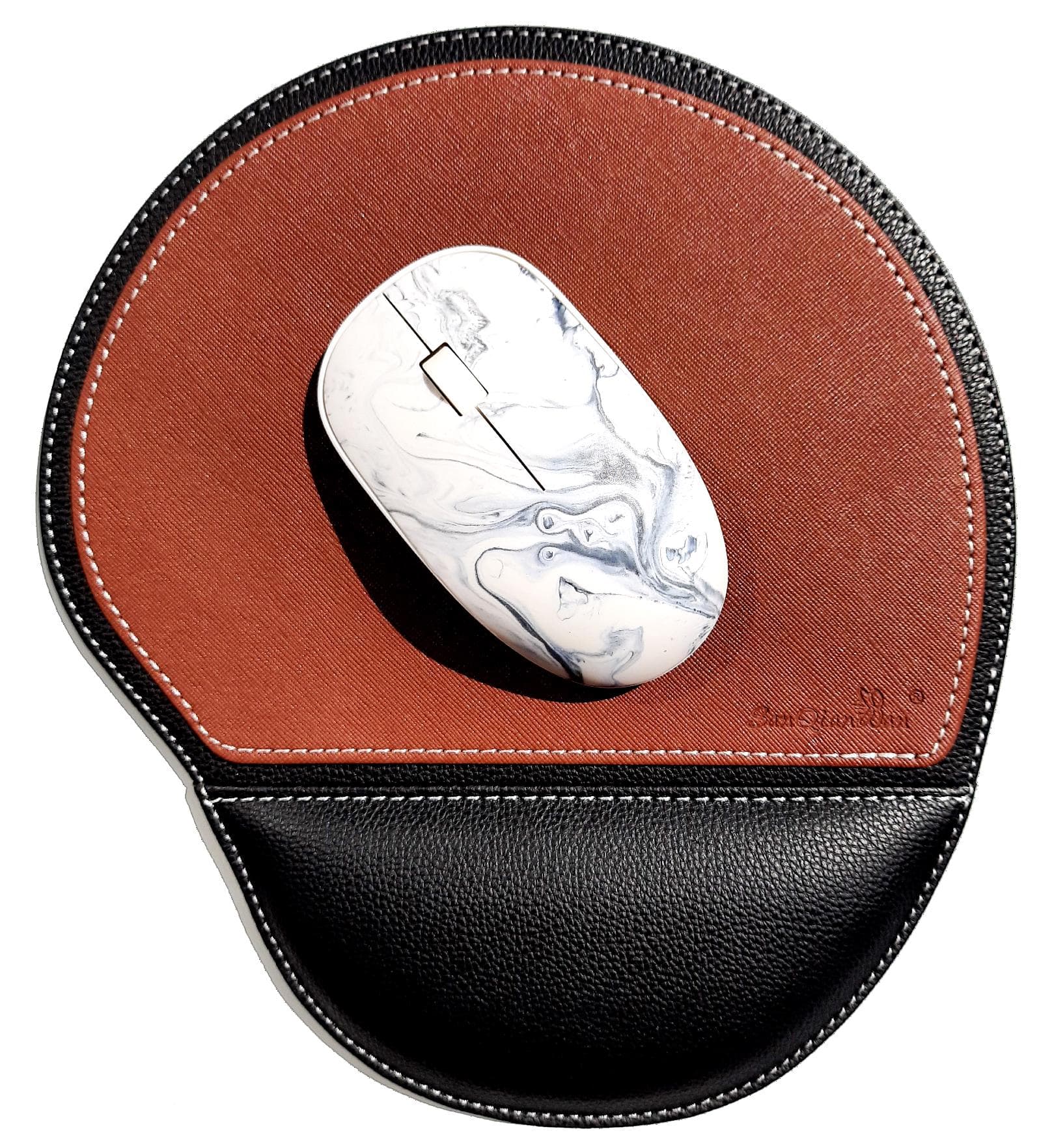 Excellent quality PU Leather Mouse Pad in Round Shape and Light Brown & Black Color, with comfortable wrist support & non-slip base.
Specially designed to make your long & extended working hours comfortable & wrist-stress free & your gaming hours more fun-filled. ERGONOMIC PAIN RELIEF DESIGN , EXCELLENT MOUSE SUPPORT, LARGER WRIST-REST, FOR ALL TYPES OF MICE, NON-TOXIC, LIGHTWEIGHT & DURABLE, EASY TO CLEAN, WATERPROOF & STAIN RESISTANT SURFACE, SMELL FREE.
Available in two different designs.