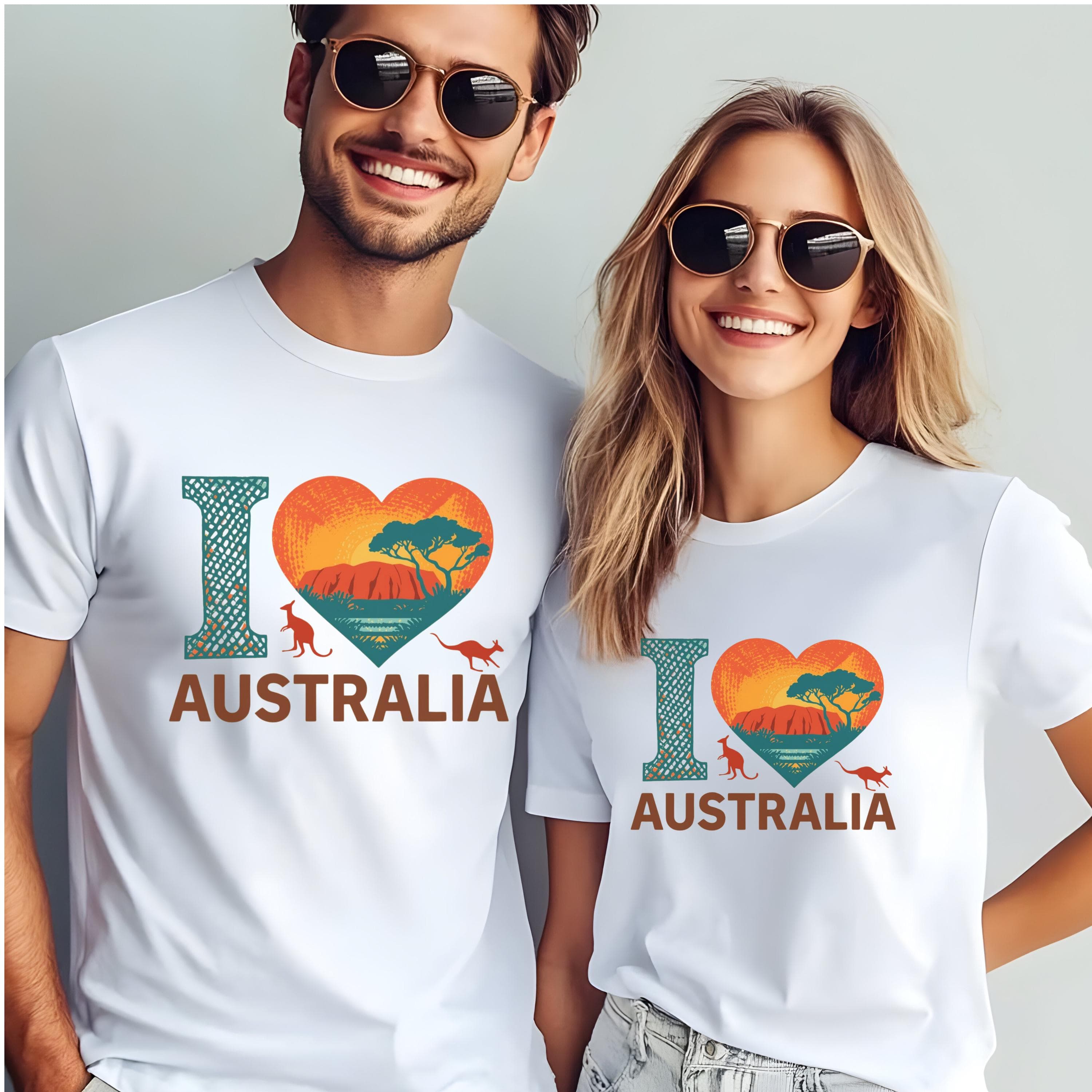 Australia Day Gildan 64000 tee with heart‑shaped Uluru design replacing the word “Love” in “I Love Australia.” Aussie pride shirt, unisex sizes XS–5XL, light color options, soft cotton, durable print. Ideal for patriotic events, travel gifts, Australian celebrations, Uluru lovers, and national pride clothing. This Aussie Tee is a perfect gift for Australia Day Celebrations and show your love for the land down under.