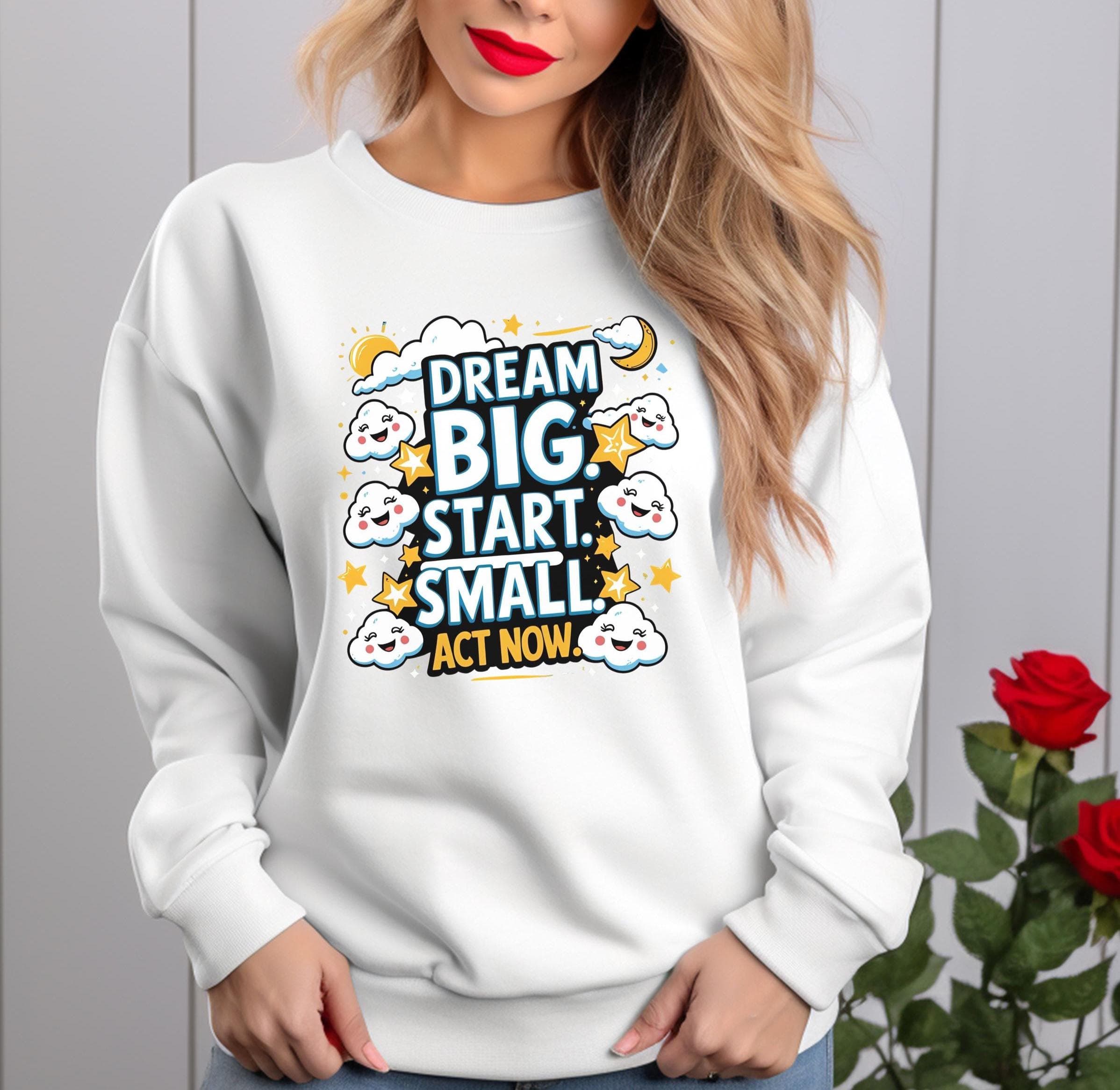 Unisex Gildan 18000 sweatshirt with motivational quote: "Dream Big. Start Small. Act Now." Soft fleece crewneck in multiple colors and sizes S–5XL. This inspirational jumper blends comfort with action mantra style. Ideal mindset apparel for students, entrepreneurs, and goal-setters. A cozy, heavy blend positive message sweater for personal growth, self-care, and everyday motivation.