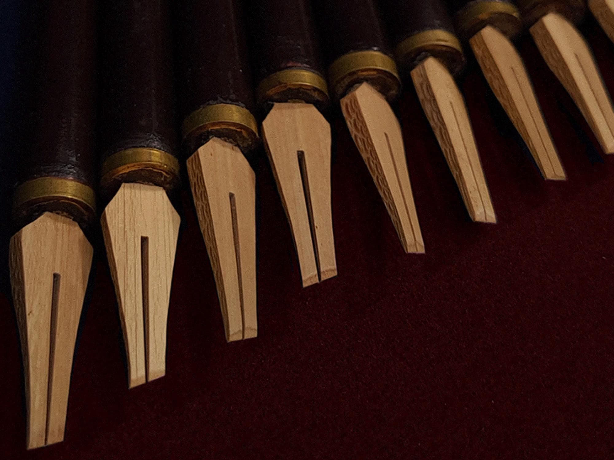 Close-up of bamboo calligraphy pen tip designed for bold strokes using water-based paint