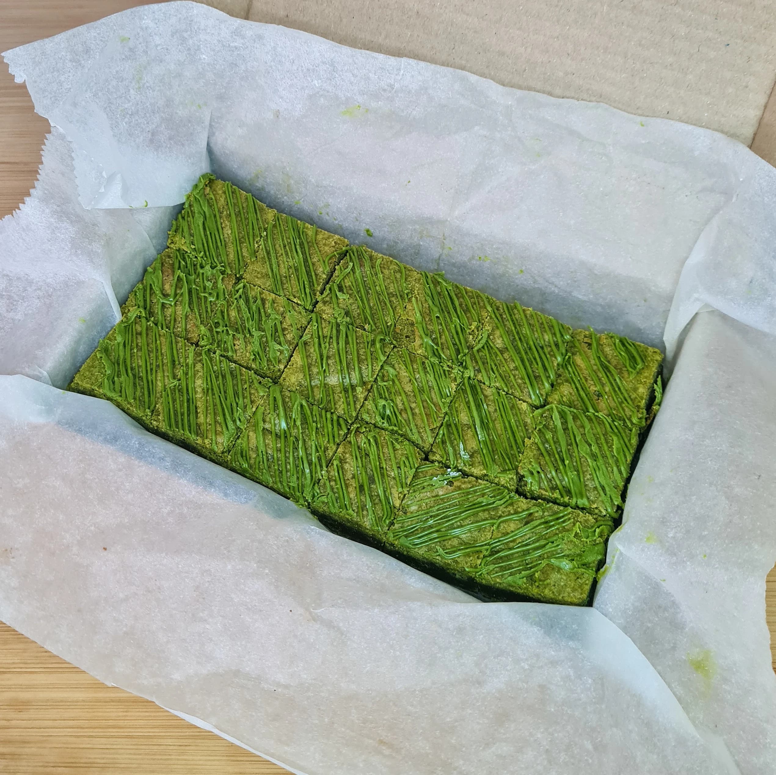 Matcha blondie bites, made with Culinary Grade Organic Japanese Matcha, in a gift box containing 18 bites