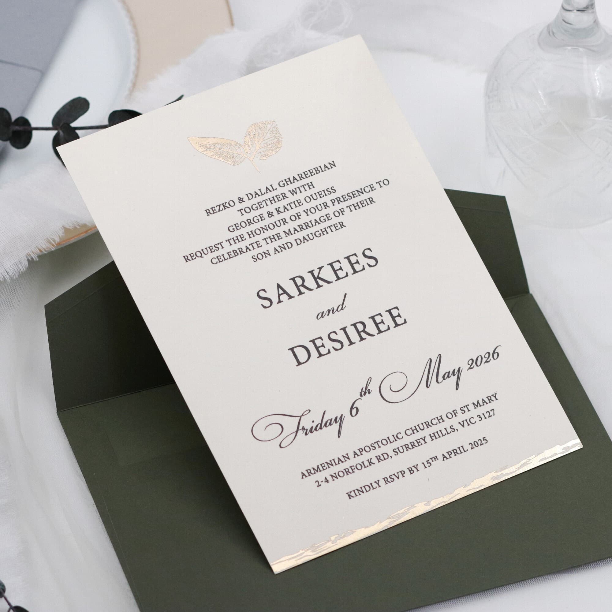 Gold Flower and Ribbon Detailed Cream Wedding Invitation - Accompanied by a Foil-Stamped Green Envelope - Perfect Harmony