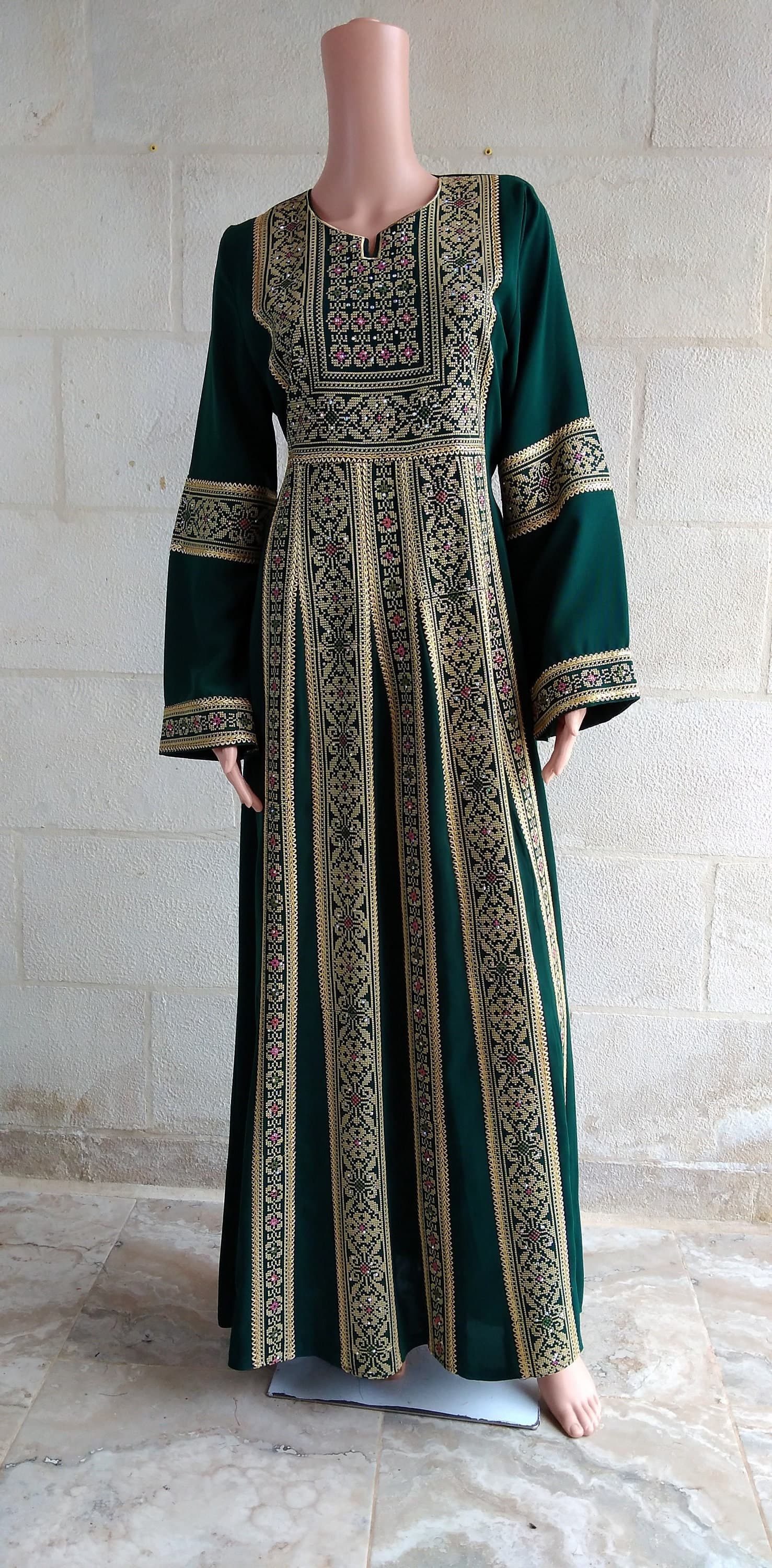 Palestinian Thobe Tatreez Dress Maxi Green with golden embroidery.