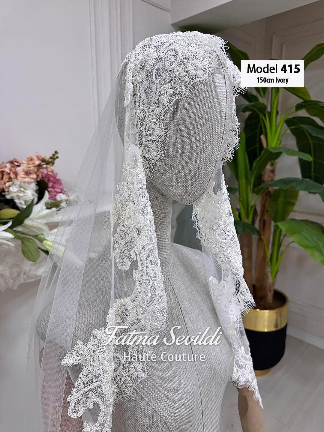 Short beaded lace bridal veil in soft ivory tulle with elegant lace edging, designed in fingertip to waltz length for classic and modest bridal styling. Hijab-friendly wedding veil option with refined detail for a timeless bridal look.