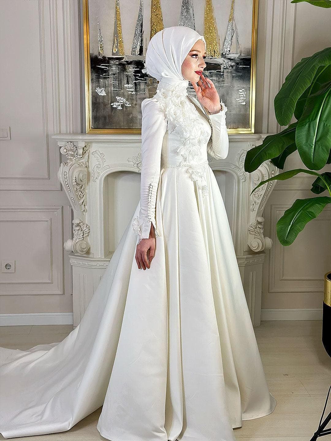 Elegant satin hijab wedding dress with long sleeves and high neck, featuring 3D floral beaded lace appliqué on an A-line modest bridal gown. Custom made for full coverage Muslim bride style.