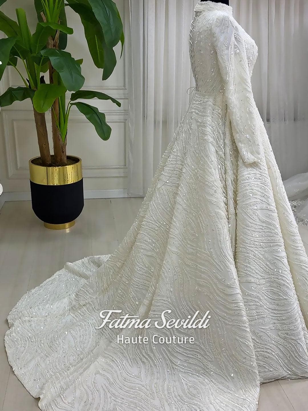 Fatma Sevildi Haute Couture hijab wedding dress, modest bridal gown with long sleeves, lace and beaded details, custom made Muslim wedding dress