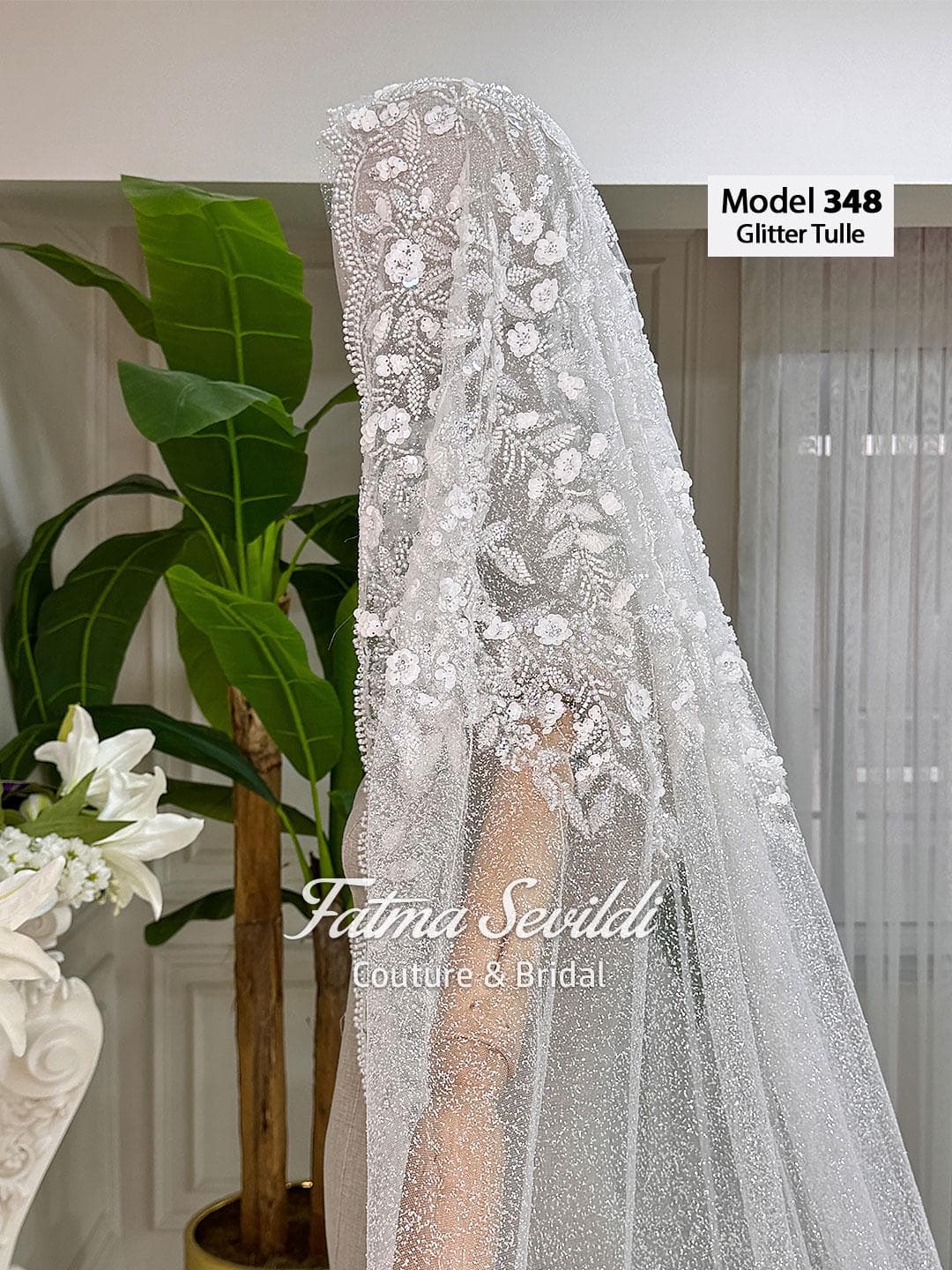 Glitter tulle cathedral bridal veil with beaded lace mantilla edge and hand-sewn appliqué for a luxury sparkle. Optional hijab head set and comb choice available.