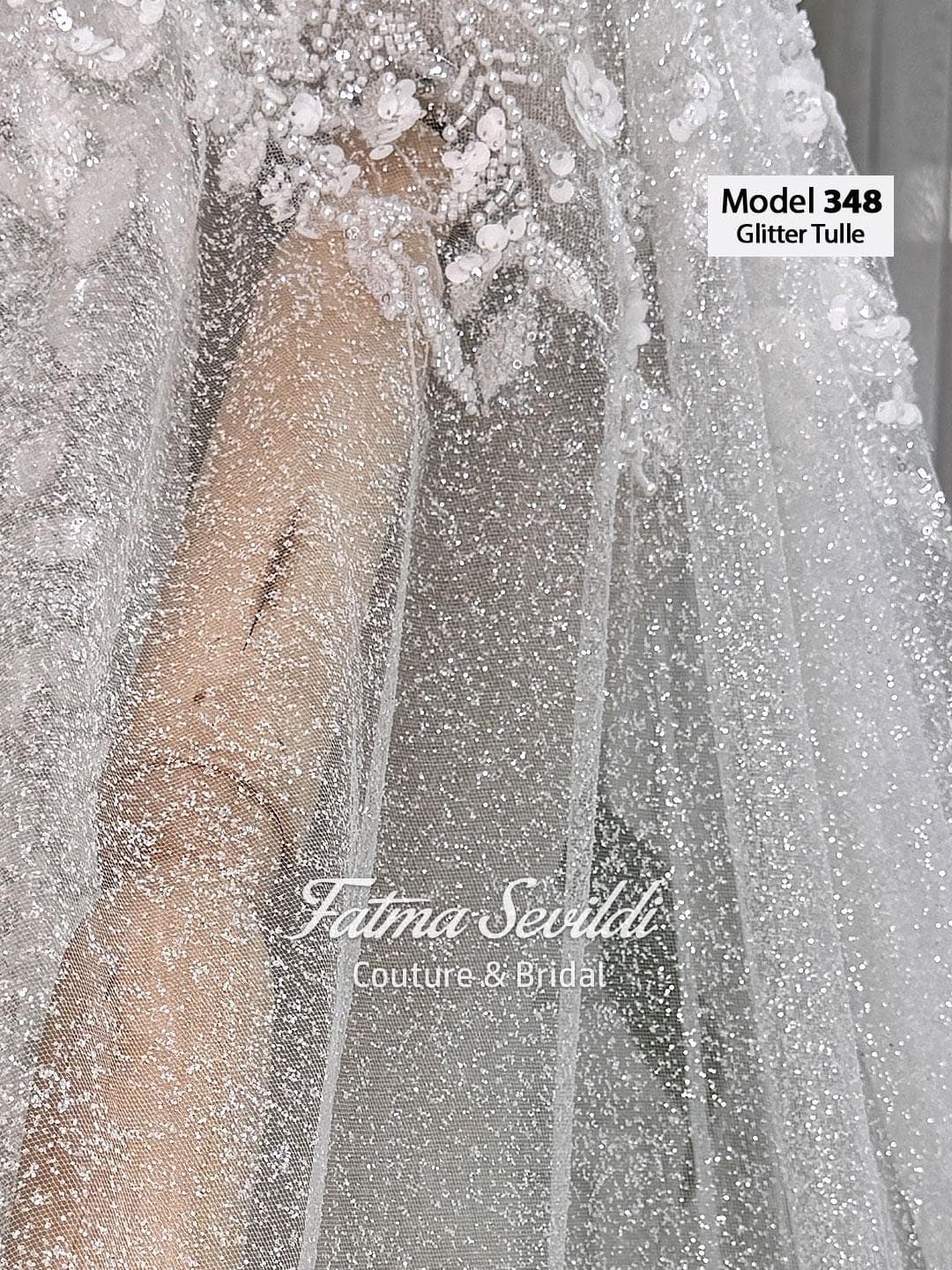 Glitter tulle cathedral bridal veil with beaded lace mantilla edge and hand-sewn appliqué for a luxury sparkle. Optional hijab head set and comb choice available.