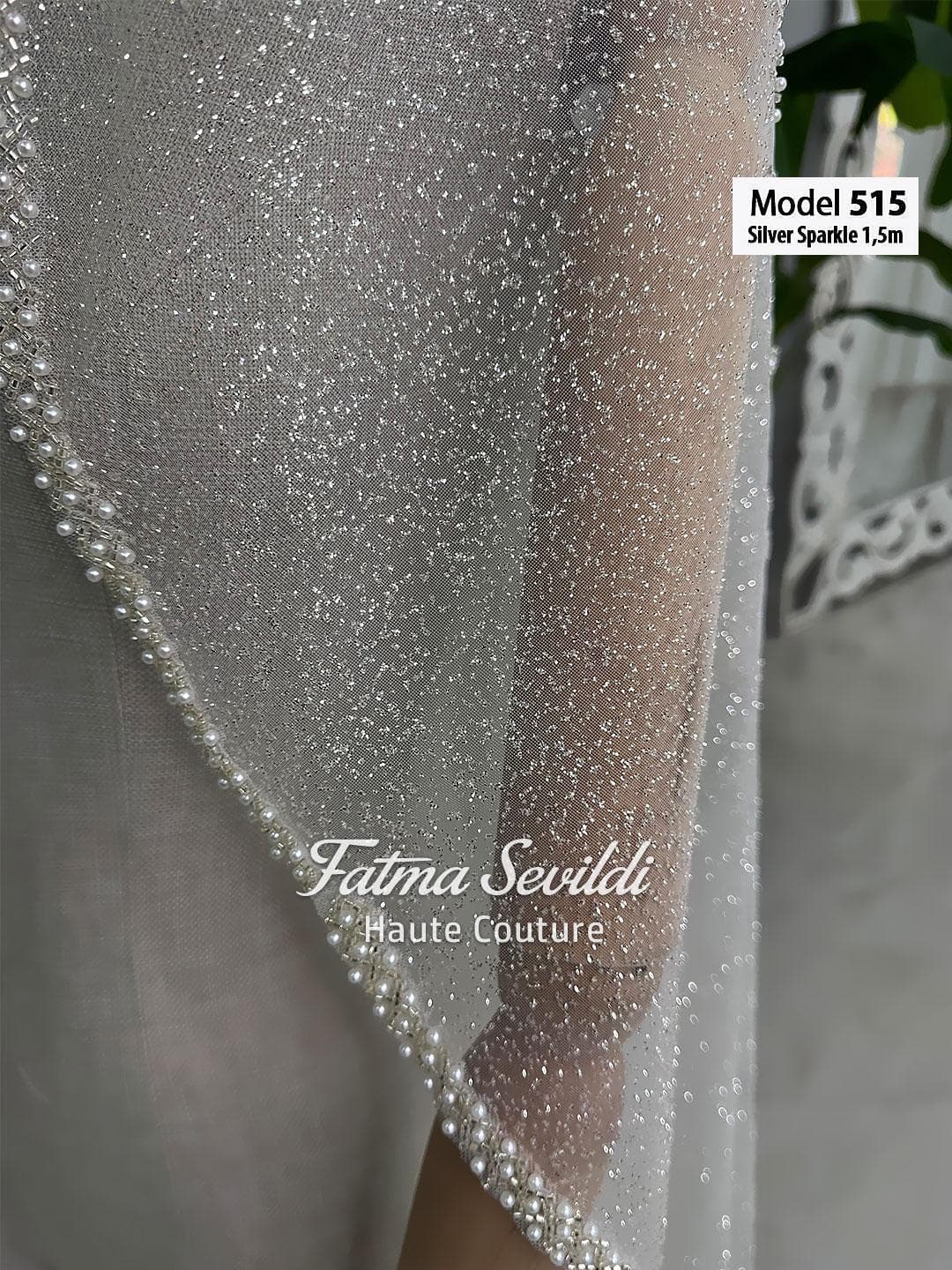 Beaded lace bridal veil in soft ivory tulle with elegant waltz to chapel length, designed for classic and modest bridal styling. Hijab-friendly wedding veil with refined lace edging and hand-finished detail for a timeless bridal look.