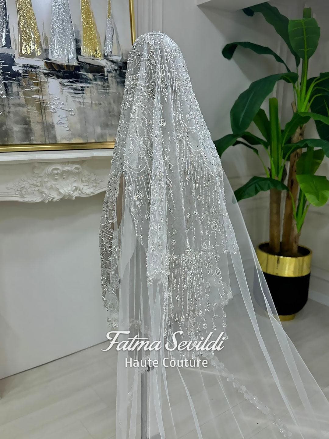 Hijab wedding veil with shimmering beaded lace embroidery and cathedral-length tulle train, designed for a modest bridal look with a luxury finish. Close-up views show the lace edge detail and elegant drape.