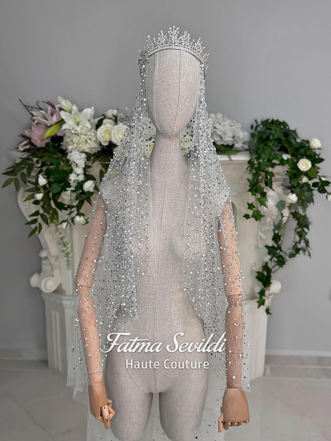 Hijab wedding veil made of cathedral-length tulle, embellished with pearls and silver crystals for a luxury modest bridal look. Shown from front, back, and close-up to highlight the sparkle and detailed beading.