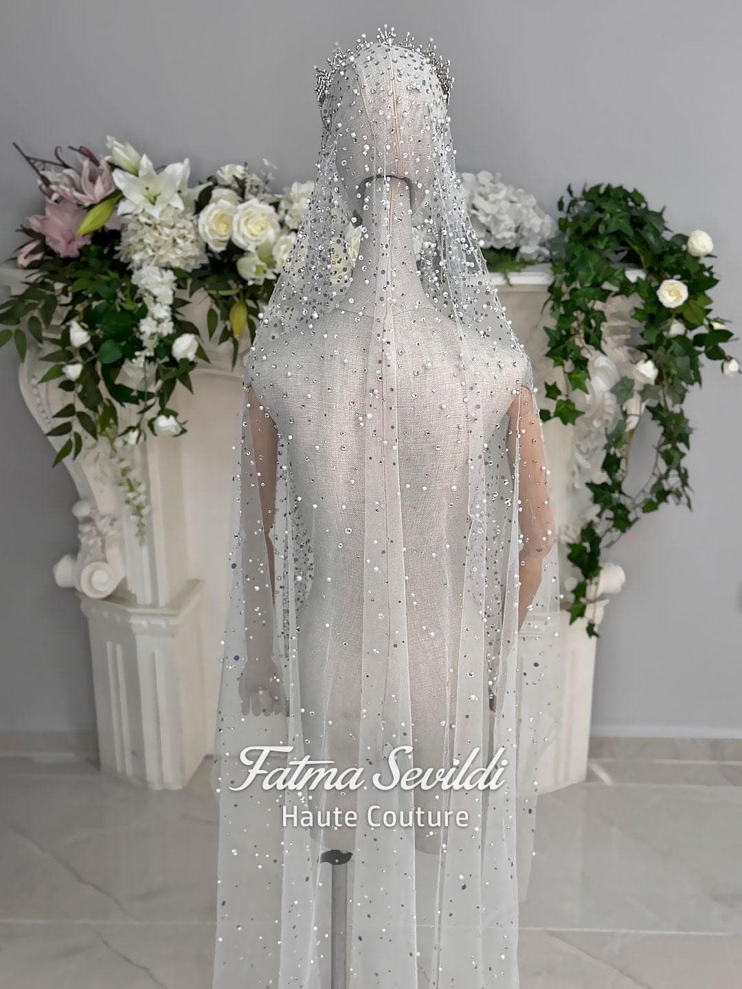 Hijab wedding veil made of cathedral-length tulle, embellished with pearls and silver crystals for a luxury modest bridal look. Shown from front, back, and close-up to highlight the sparkle and detailed beading.