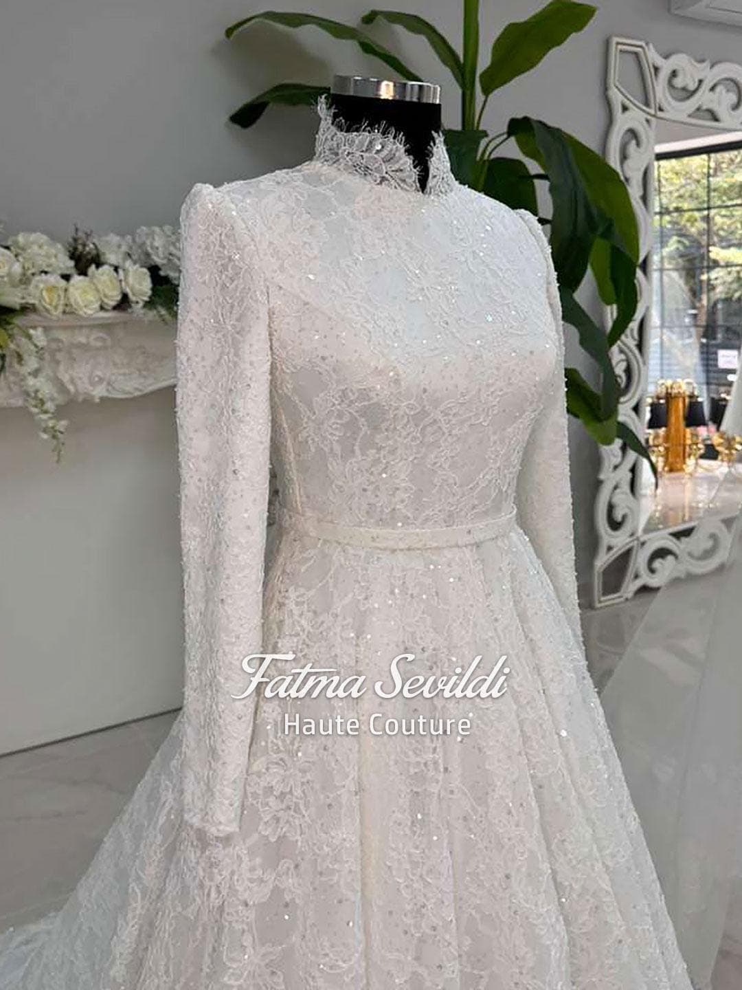 Veiled hijab wedding dress with high neck, long sleeves, and full beaded lace for a luxury modest bridal look. Includes premium lace veil and matching headscarf.