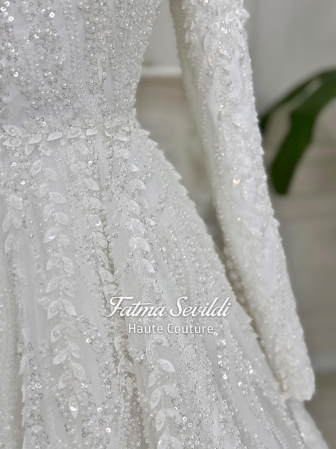 Veiled hijab wedding dress with full beaded lace, high neck and long sleeves in a luxury modest ballgown silhouette, made to measure. Includes a matching premium lace veil for a complete Muslim bridal set.