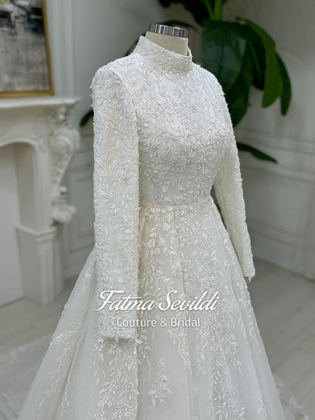 Veiled hijab wedding dress in a luxury 3D lace ballgown silhouette with high neck and long sleeves, made to measure for modest bridal coverage. Includes a matching premium lace veil for a complete Muslim bridal set.