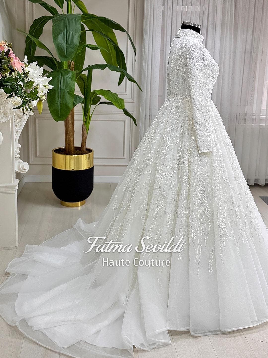 Veiled hijab wedding dress with full beaded lace, high neck and long sleeves in a luxury modest ballgown silhouette, made to measure. Includes a matching premium lace veil for a complete Muslim bridal set.