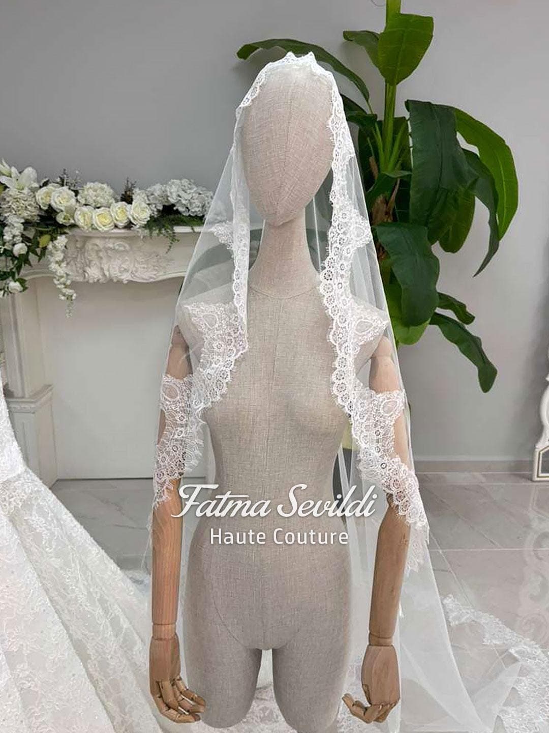 Veiled hijab wedding dress with high neck, long sleeves, and full beaded lace for a luxury modest bridal look. Includes premium lace veil and matching headscarf.