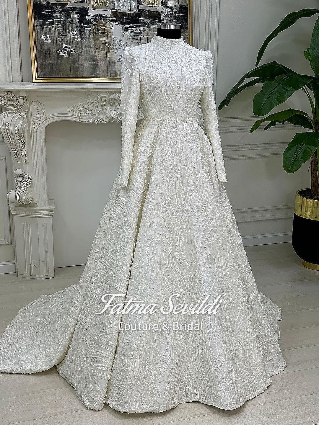 Fatma Sevildi Haute Couture hijab wedding dress, modest bridal gown with long sleeves, lace and beaded details, custom made Muslim wedding dress