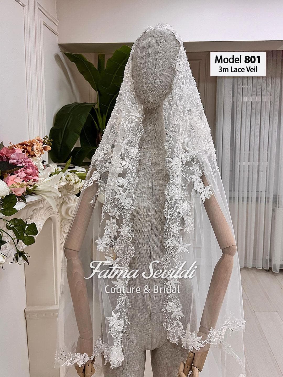 Veiled beaded lace-edge cathedral bridal veil on soft premium tulle, designed for hijab-friendly modest wedding styling. Hand-sewn lace motifs for a couture drape and elegant movement.
