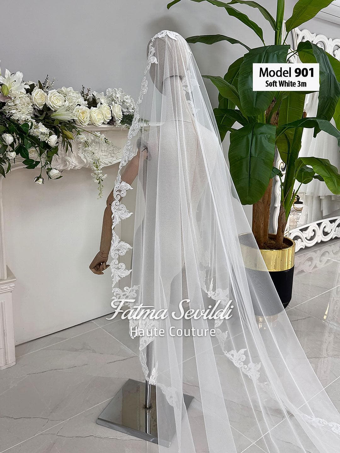 Hand-sewn beaded lace cathedral wedding veil in soft ivory tulle, designed for elegant classic and modest bridal styling. Hijab-friendly long bridal veil with refined lace detail, graceful drape, and a timeless couture finish.