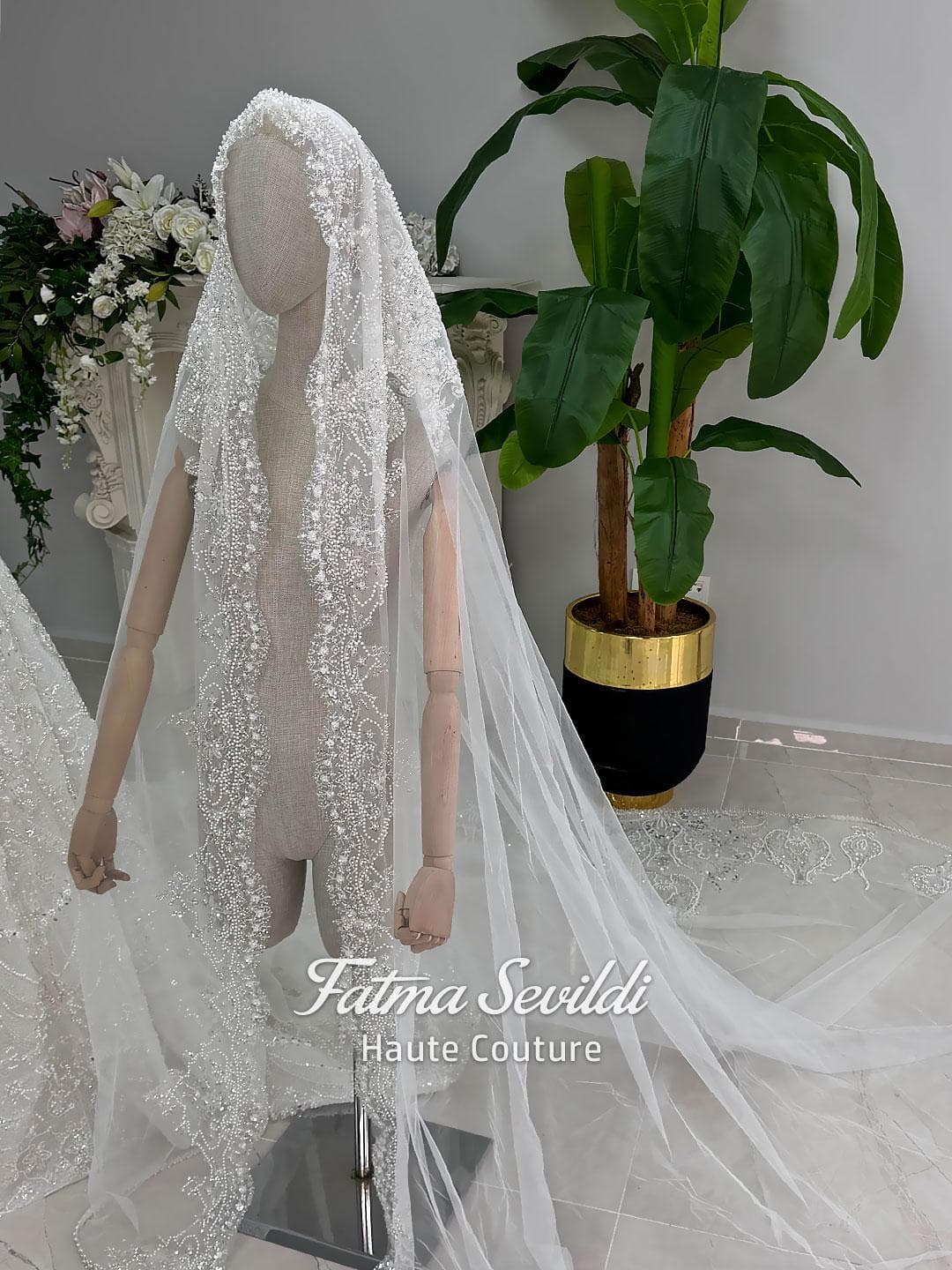 Fatma Sevildi Haute Couture hijab wedding dress, modest bridal gown with long sleeves, lace and beaded details, custom made Muslim wedding dress
