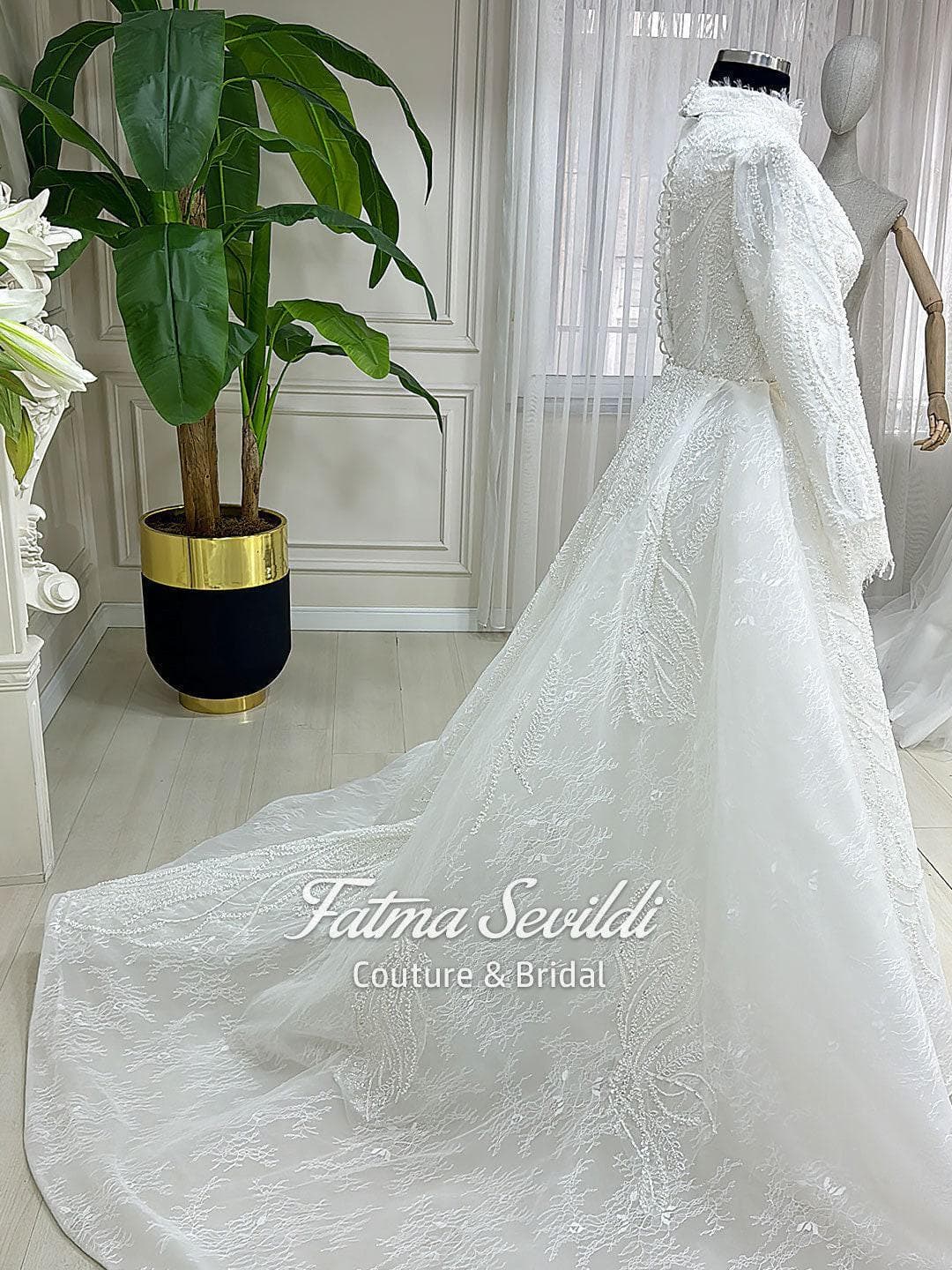 Veiled hijab wedding dress in a modest mermaid silhouette with detachable skirt and hand-beaded lace, made to measure for luxury coverage. Includes a premium lace veil for a complete couture bridal set.