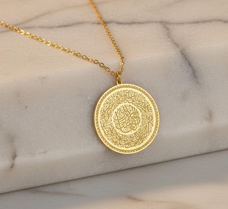 ✨ The Perfect Blend of Faith and Luxury

"Gift a symbol of faith that speaks volumes. Our exquisite Al-Fatiha Necklace features the entire Fatiha Surah, the opening chapter of the Quran, intricately engraved in beautiful Arabic Calligraphy. This is more than just jewelry—it’s a powerful, wearable piece of Islamic Art that serves as a constant reminder of devotion and protection."