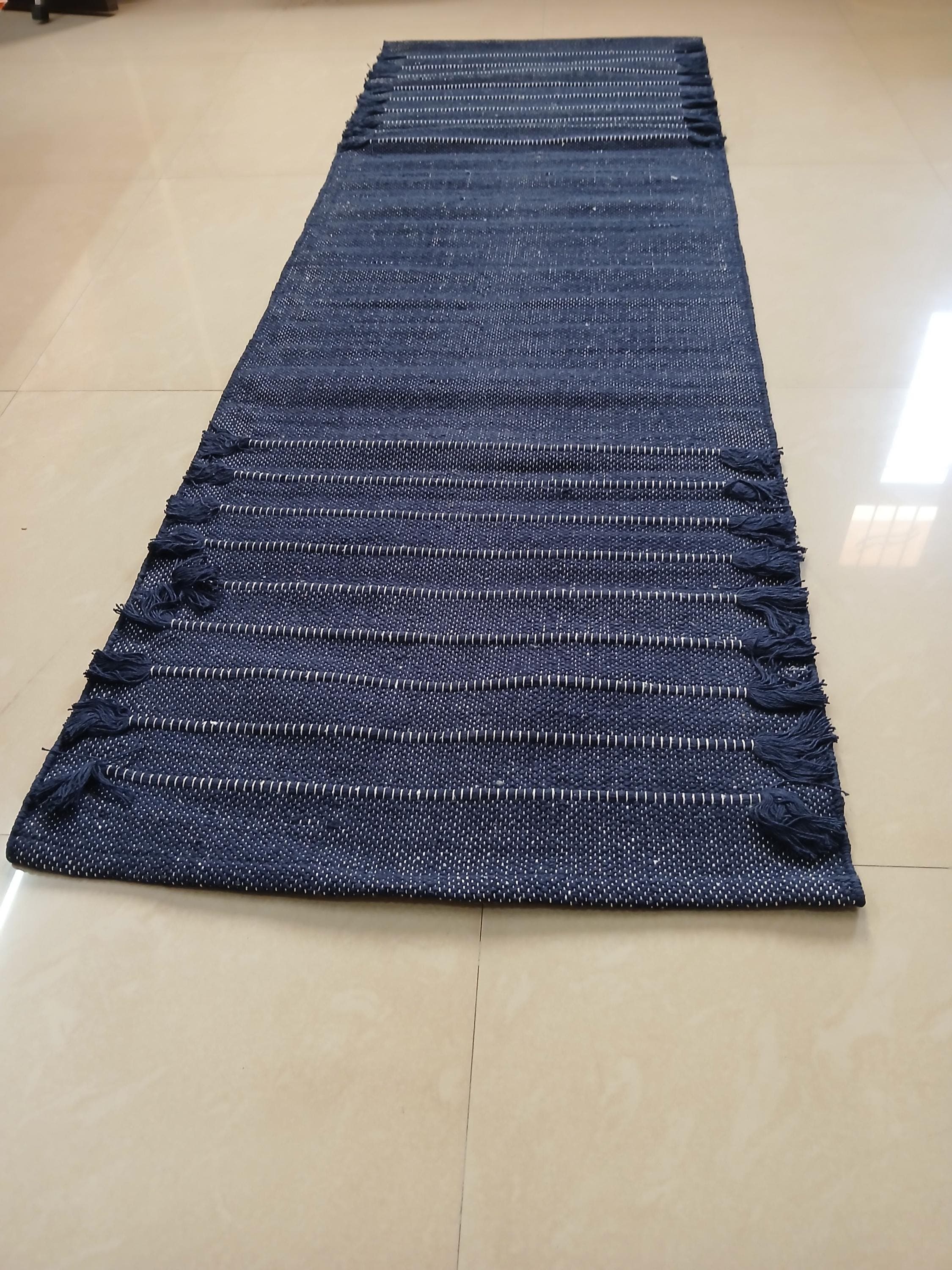 Blue yoga mat floor setup minimalist home yoga practice eco friendly