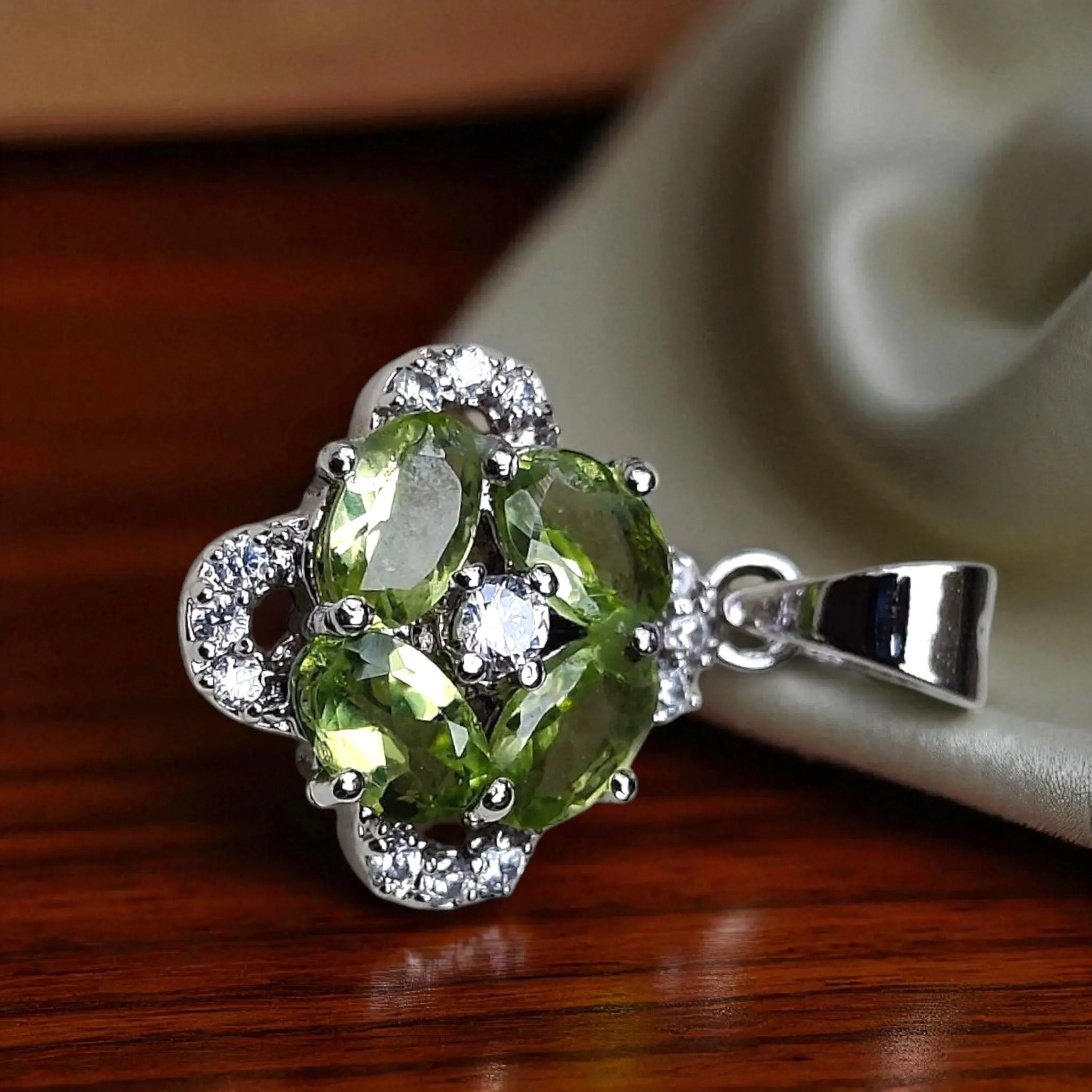 Sterling Silver Peridot Pendant: Lab Diamond Accent, Oval & Round