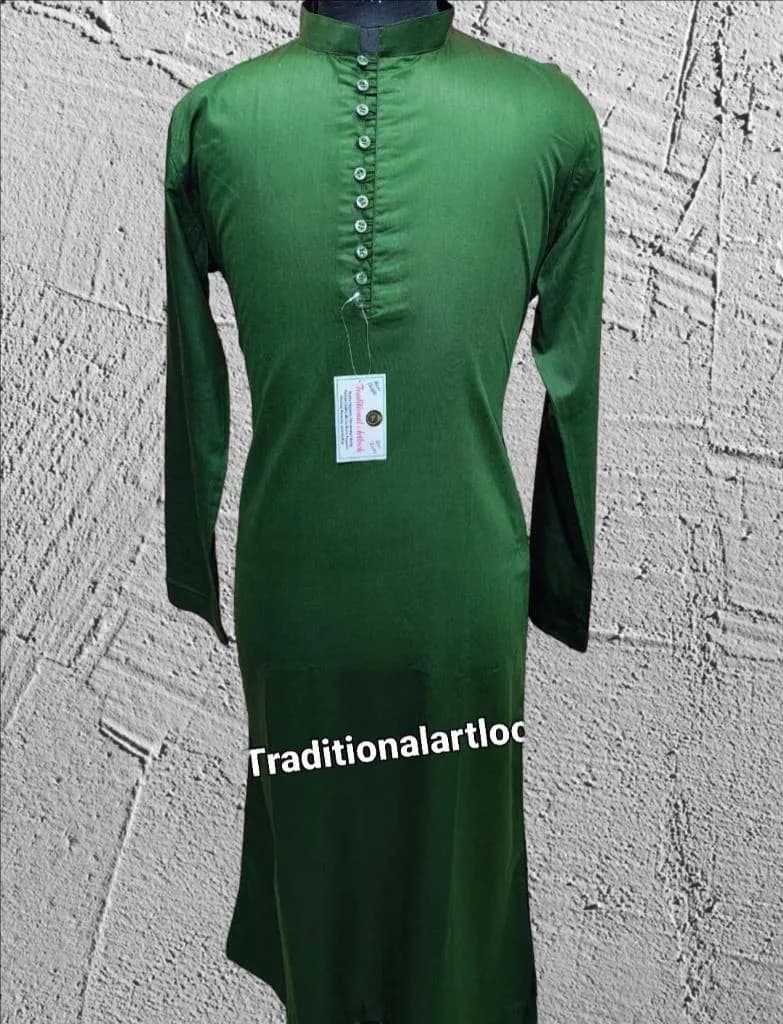 May include: A long-sleeved, dark green tunic with a mandarin collar and a series of buttons down the front. The tunic has a tag attached and the text "Traditionalartloc" is visible at the bottom.