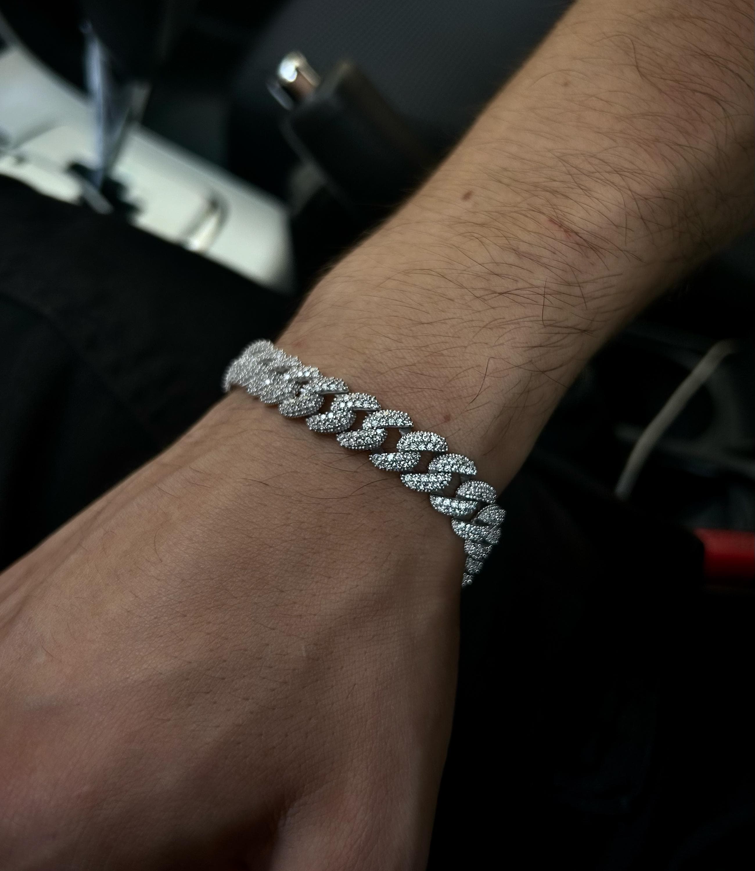 Crafted from 925 sterling silver and finished with rhodium plating, this iced Cuban bracelet offers timeless luxury and refined brilliance — a perfect gift for stylish men.