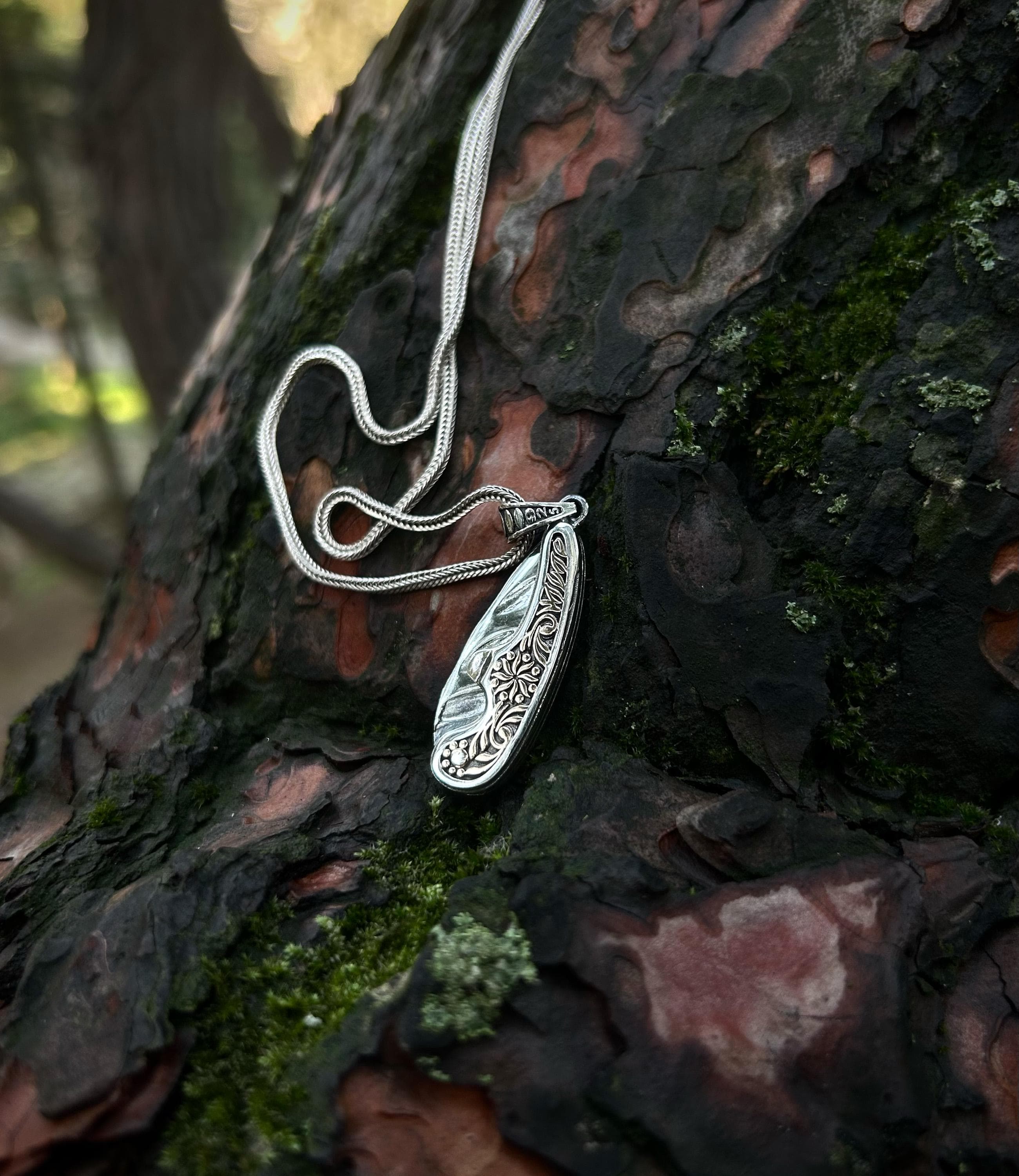 Sterling silver blade gadget necklace with mechanical folding pendant